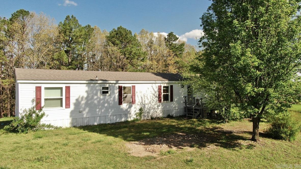Welcome to 593 Hillhollow Road—an exceptional opportunity to own 37.09± acres in the Marshall/Morning Star area of Arkansas, just in time for spring and turkey hunting season! This property features a well-maintained single-wide mobile home, perfect for a full-time residence, weekend getaway, or base camp while you build. Fiber internet has just been installed for added convenience. The land offers a beautiful mix of open pasture and mature timber, ideal habitat for wildlife, with abundant deer and turkey. A year-round, spring-fed creek runs along the back, providing a reliable water source and added charm. With no restrictions, the possibilities are endless—perfect for hunting, homesteading, livestock, or a private retreat. Enjoy peaceful seclusion and stunning Ozark views, all just a few miles from South Maumee access on the Buffalo National River for floating, fishing, and hiking. Whether you're looking to hunt, relax, or invest, this property has it all. Schedule your showing today!