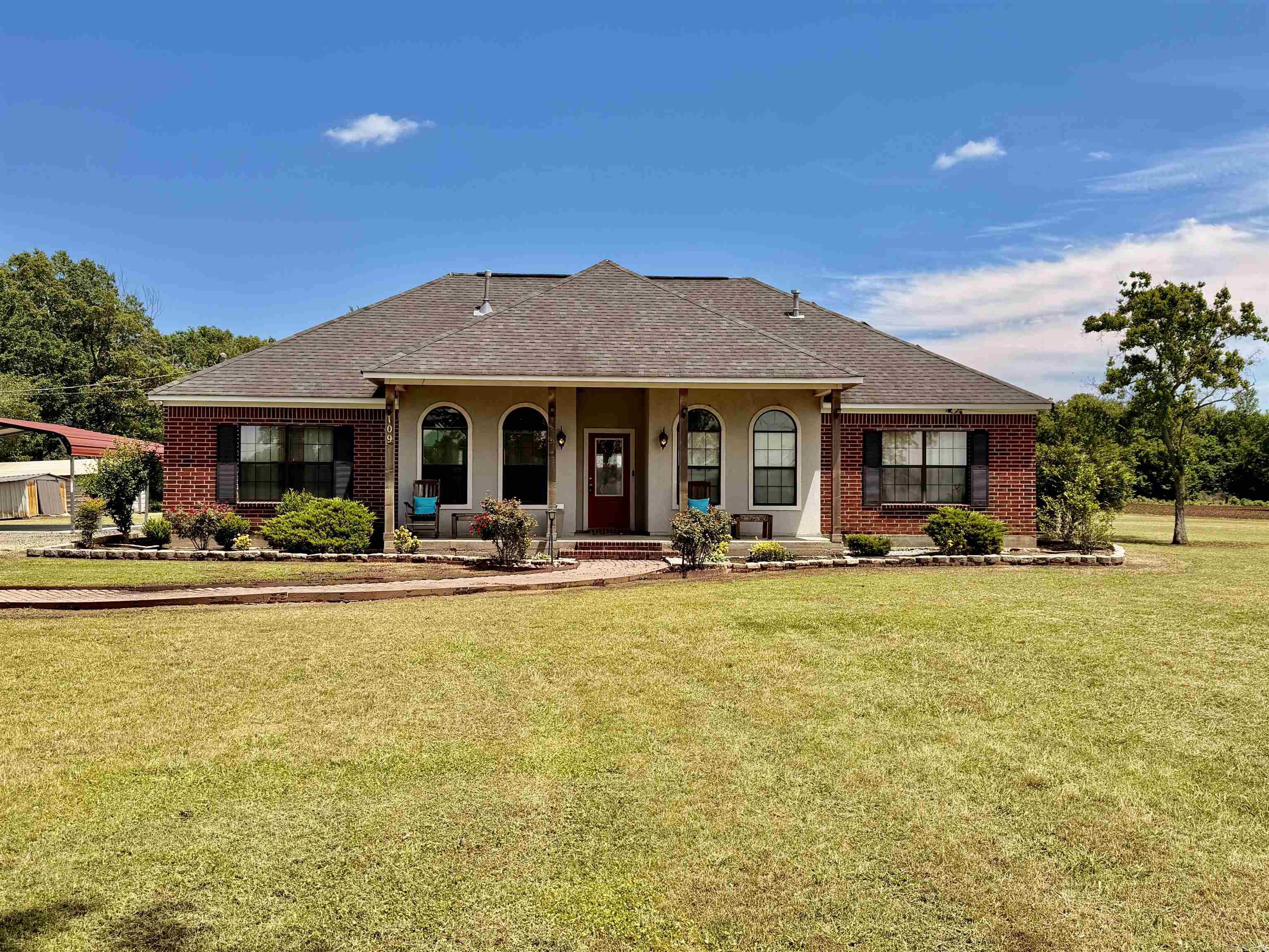 Looking for a country living feel while being in town? This is the property for you! This beautiful 4 bedroom, 2.5 bath home offers 2018 sq ft of comfortable open concept living space. Built in 2016, this lovely property boasts modern updates such as beautiful granite countertops and tile work in kitchen and master bath. Situated on 3 acres, this property provides the perfect blend of convenience and privacy-being close to town amenities while still feeling tucked away in the country. Enjoy spacious living, beautiful surroundings, and a quiet setting that feels like home. Contact Kara Beth today at 870-501-2500 for more information!