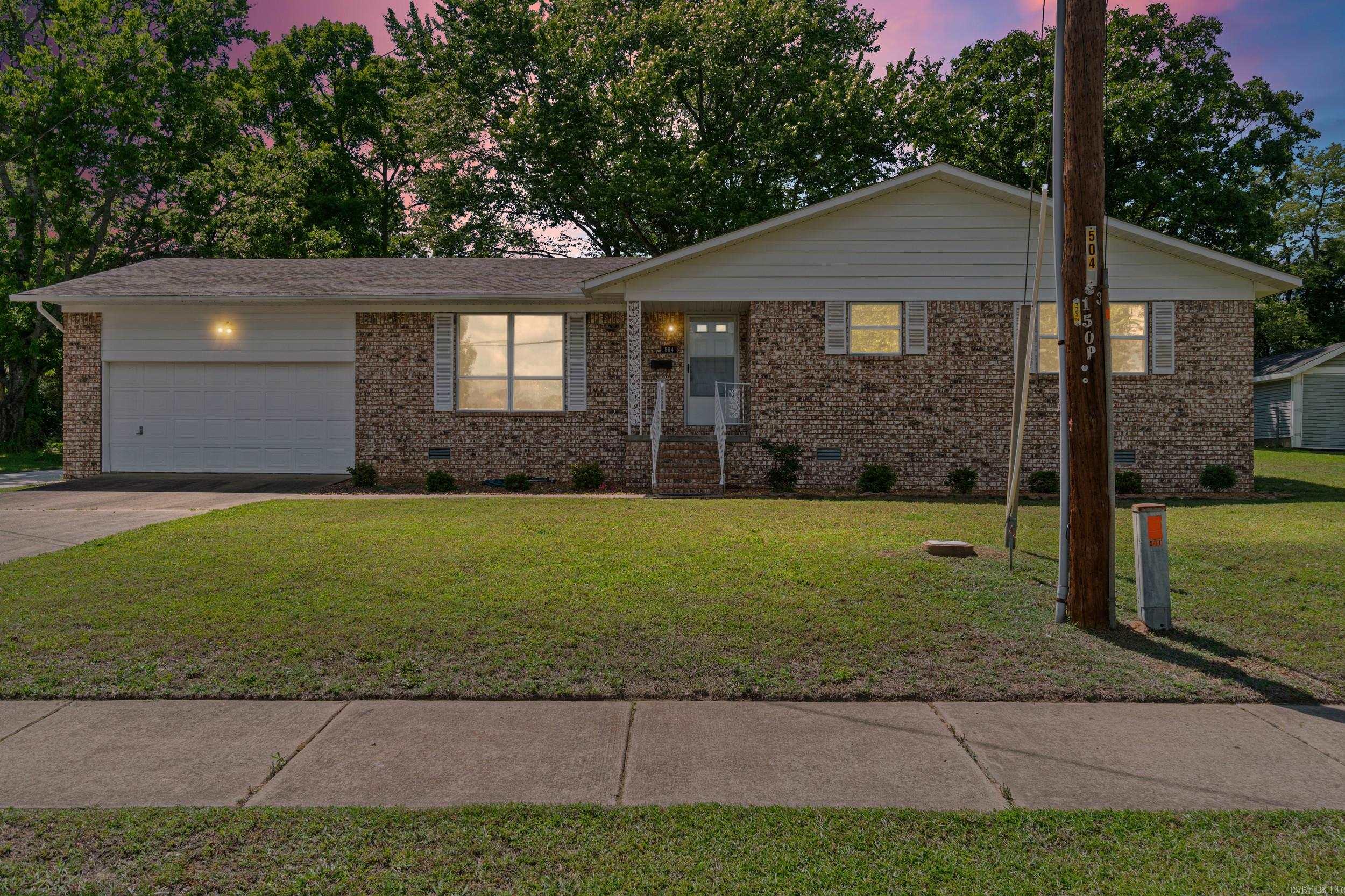 Beautifully maintained home with numerous updates throughout. Features include new architectural shingles and a Lennox HVAC system (2019). Recent improvements in 2025 include a new garbage disposal, fresh exterior paint, and newly screened porch. Interior updates completed in 2016 include paint, flooring, and updated electrical outlets and switches.  The home comes fully equipped with all appliances, including a refrigerator, gas stove, washer, and dryer. Enjoy a comfortable living room that flows seamlessly into the dining and kitchen areas, creating an inviting space for everyday living and entertaining. A separate laundry room adds convenience.  Step outside to a large, fenced backyard with a screened back porch—perfect for relaxing. Additional features include a storm cellar, storage building, garage, and extra storage space.  Ideally located within walking distance to schools and a sandy beach, this home offers both comfort and convenience in a desirable setting.