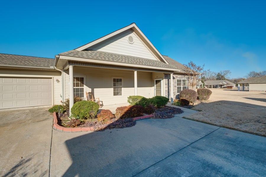 Wonderful patio home in a gated community!  Great layout with open Kitchen to Living Room and Split Bedrooms.  New Paint on walls and baseboards in Living Room and Kitchen!  Home includes laundry room, spacious 2 car garage, walk- in closet in master bedroom, and gas log fireplace!  Quaint back patio fully fenced.  Community also has a clubhouse available for entertaining.  Come see!!