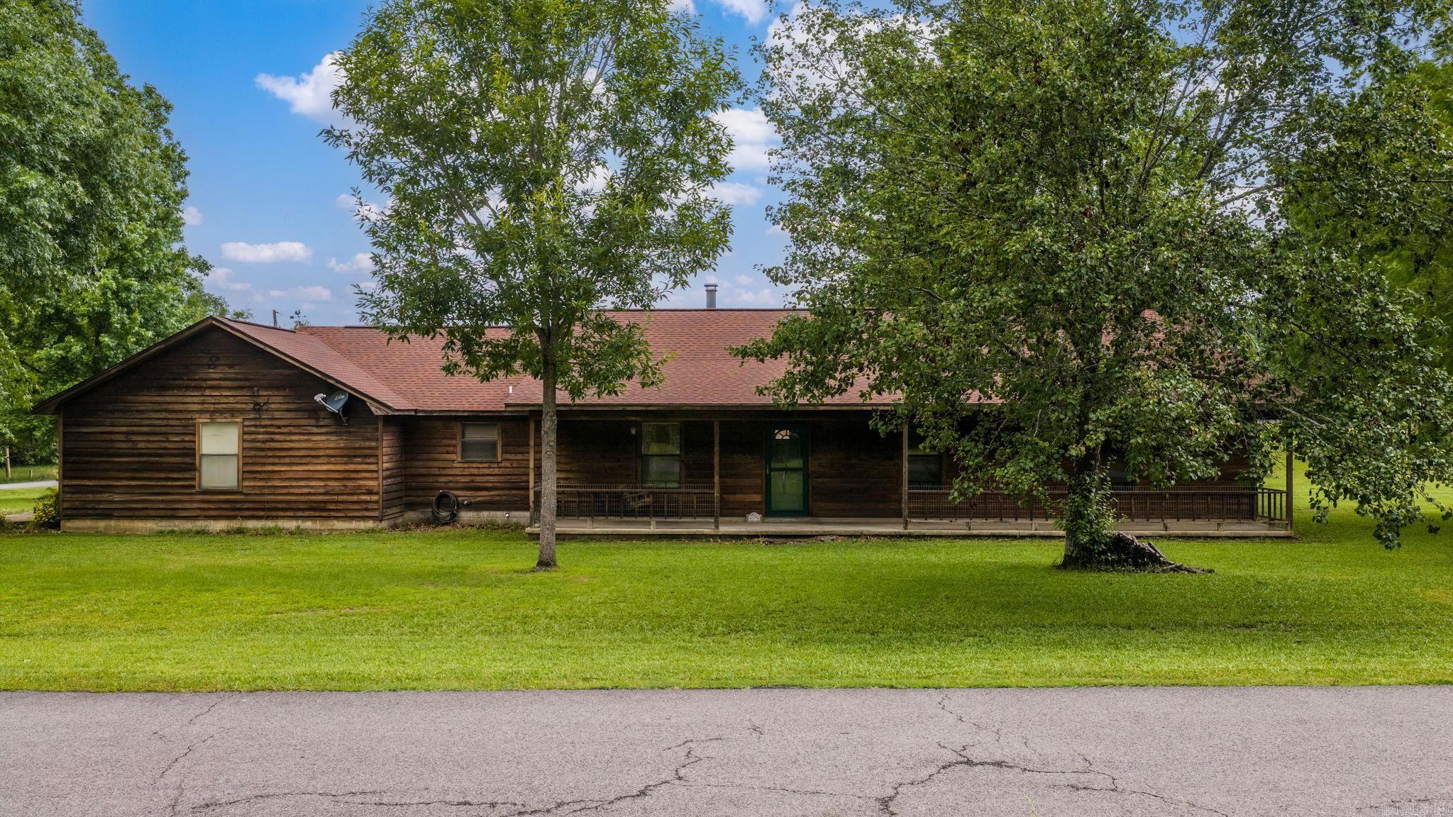 There is no wasted space in this 4 bedroom, 2 Bathroom home with 1957 sq ft of living space, built in 1991 and sitting on a corner lot with 1.40 acres for entertaining or gardening. Home features a wood burning fireplace, laundry room and a large living area. The roof was replaced about 10 years ago. The home could use some updates, it has a very functional layout, and nice curb appeal making it an excellent opportunity for you to make it your own.  Agents please see remarks.