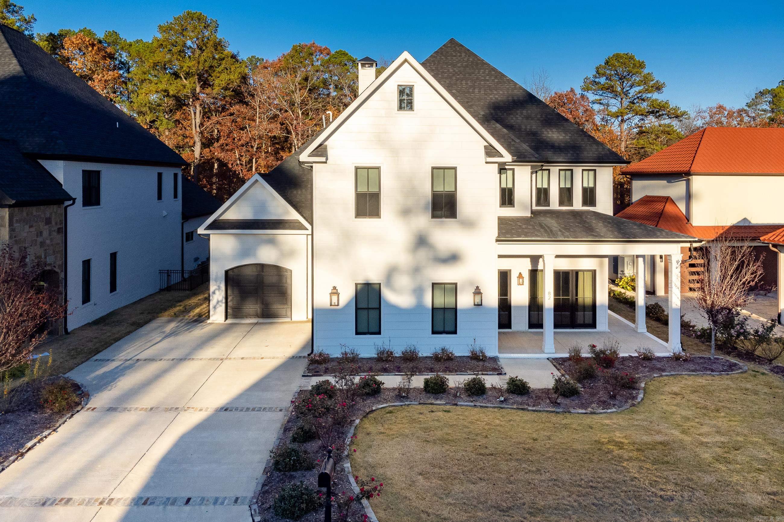 Stunning newer home on Chenal Valley Golf Course. Two Story Great room w/ 21 ft Marvin bi-folding patio doors. Fabulous gourmet kitchen, 10 X 6 island, 48" built in fridge, 3 ovens, 48" range.  Spectacular master suite with Fireplace and luxurious spa inspired bath, 11 foot shower and 12 X 19 closet! Sep. Guest suite on main floor.  2 large bedrms up w/private baths+ 3 bedrm makes excellent game room.  3 car side load garage.  Beautiful outdr entertaining / kitchen and pool!  HOA includes yard maint. Gated