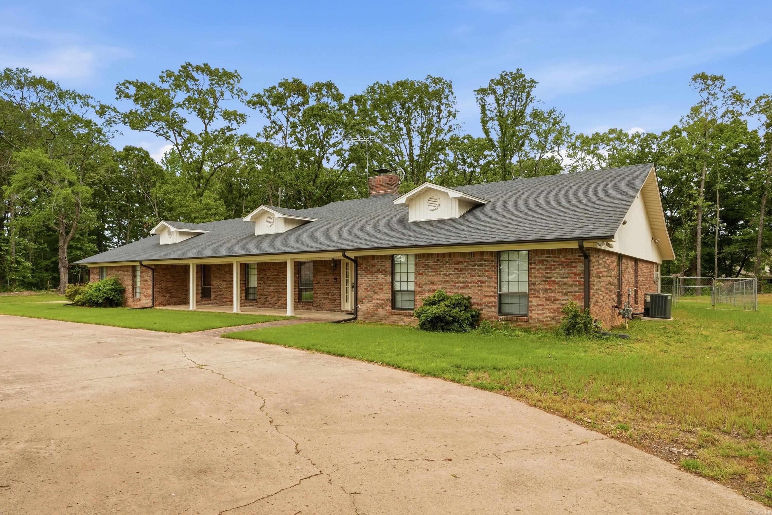 Opportunity meets location with this 4 bed, 2 bath home on 2.5 acres in the heart of Greenbrier! You truly can’t beat this central location while still enjoying space and flexibility.  While the home could use some updates, the seller is offering a $10,000 buyer concession, making this the perfect opportunity to add your personal touch and build equity right away.  Inside, the kitchen is equipped for those who love to cook, featuring a gas cooktop, double oven, new dishwasher, and a refrigerator that conveys. The home is connected to city sewer for added convenience, and a brand new roof was installed on April 10, 2025.  The property offers a fenced portion of the acreage, with plenty of additional space to expand, build a shop, or create your ideal outdoor setup—no restrictions!  Don’t miss your chance to own acreage, flexibility, and location all in one!
