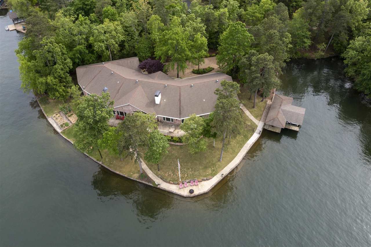 Possibly the best house with the best views on the entire Lake Balboa.  Sitting on a 2/3 acre peninsula with over 180 degree, completely unobstructed open channel views, this marvel of a house boasts 5,583 sqft of luxury living on all one level.  Completely redone since 2014, inside and out, this home boasts more features than I can list here - from matching Viking appliances to a his and hers closet, this home must been seen to be appreciated.  Agents - please note showing instructions.