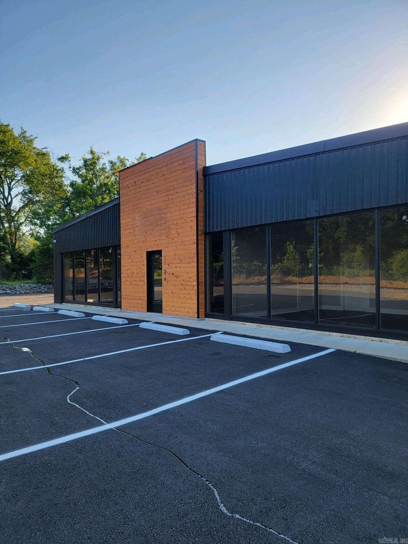 SPACE AVAILABLE JULY 1, 2026! Office building offering a 228 sq ft private office for lease. Amenities include a shared kitchen, a staffed reception lobby, and access to a community lounge and meeting space. The building is secure, featuring electronic fob entry and security cameras for added peace of mind.  Ideal for small businesses or professionals seeking a convenient, well-equipped, and secure office environment.  Tenant pays a portion of utilities including: water, electricity, gas, trash collection, WiFi, pest control, and security system monitoring.