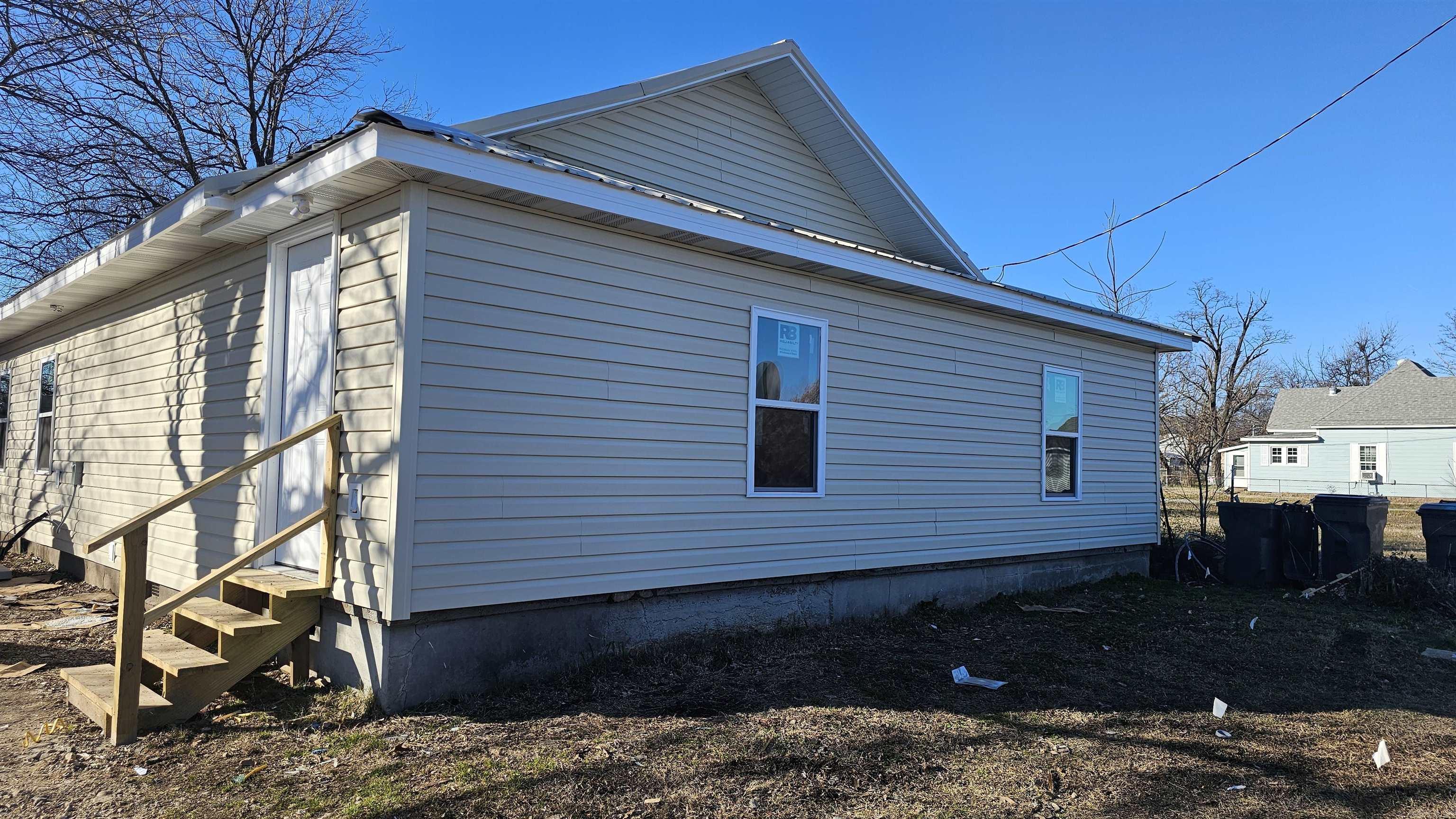 Newly Remodeled Duplex – Turnkey Investment Opportunity. This fully renovated duplex has been rebuilt from the studs up including engineer approved firewalls with city-approved permits and inspections, offering peace of mind and modern comfort. Each side features its own unique layout—one unit with 2 bedrooms, the other with 3—making it ideal for a variety of tenants. Convenient parking is available both in front and via alley access. While there are no washer/dryer hookups, tenants enjoy separate electric and garbage services. The landlord covers water and sewer, as the property currently has a single water meter (there is space to add another one). With both units currently rented, this property generates solid income and is ready for your portfolio. Don’t miss this low-maintenance, high-potential investment! Call your favorite agent today to view! *AGENTS: SEE SHOWING REMARKS!*