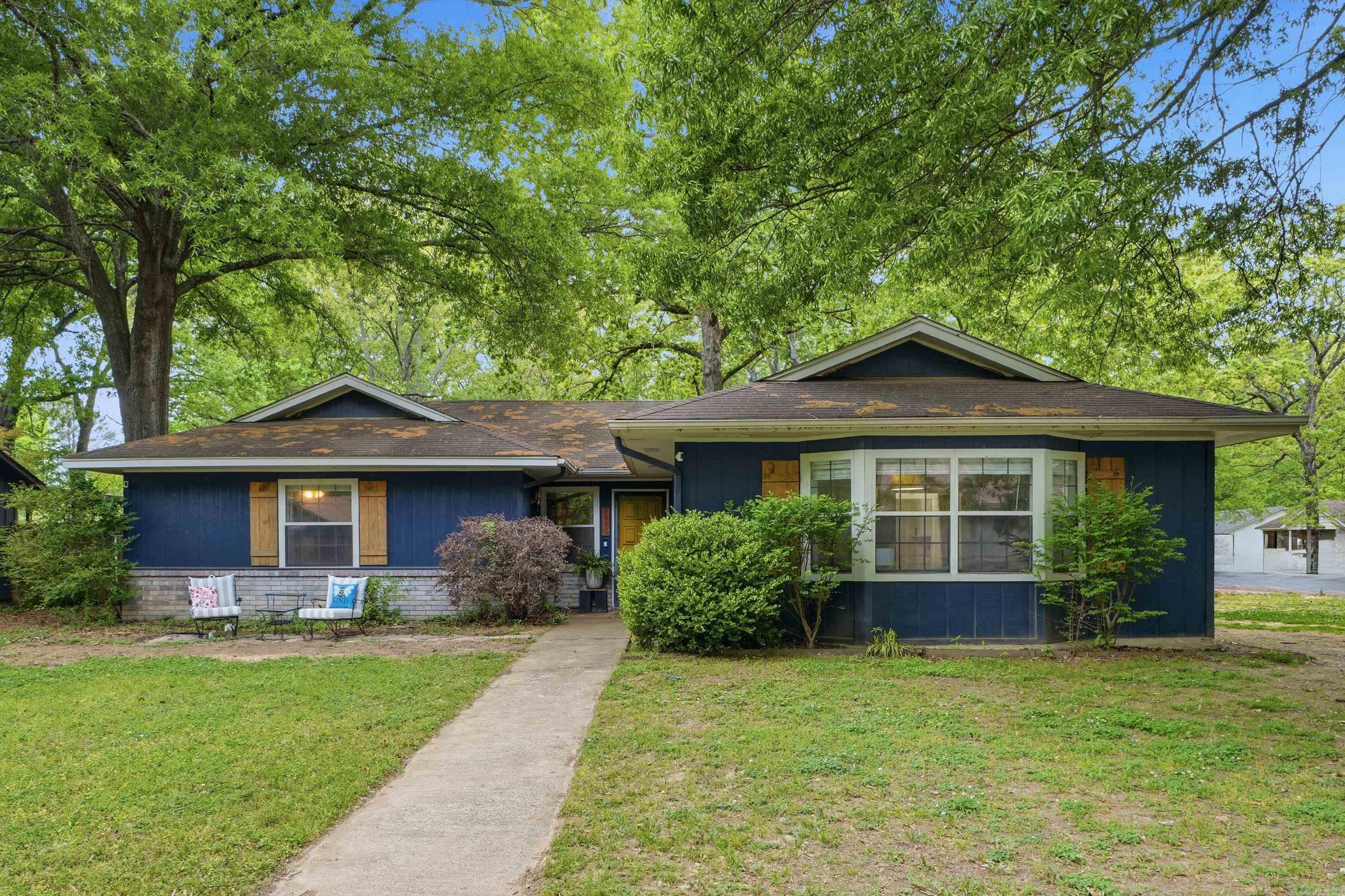 Need lots of space at a reasonable price?  Look no further...this home has space for everyone! Features include a huge great room, an updated kitchen and butler's pantry, new luxury vinyl throughout, large dining area, and breakfast room with custom built-ins.  With 5 bedrooms and 3 full baths, the possibilities are endless!! Seller is willing to have new roof installed prior to sale.