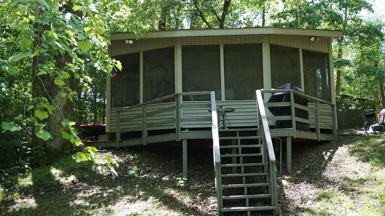 Always wanted a fishing cabin?  Here it is--essential, affordable, immaculate cabin with a great dock on one of the best locations on the Little Red.  Located on deep water between two shoals.  Big screened porch overlooking the cold clear water of a world class trout fishery.  Garage for parking or boat storage, outbuilding for "all that other stuff". Hays Rd passes by Magness Lake, home of the famous Cleburne County trumpeter swans.  Low maintenance & overhead.  All new PEX plumbing. AGENTS SEE REMARKS!!!
