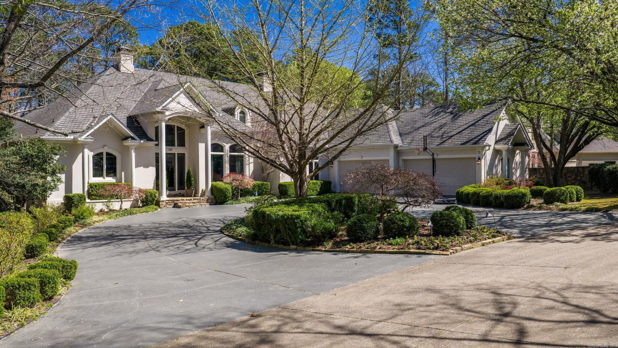 Overlooking the scenic fairways and tranquil lakes of Chenal’s Founders Golf Course, this exceptional home offers breathtaking views and timeless appeal. The backyard is designed for relaxation and entertaining, featuring a beautiful in-ground Gunite saltwater pool perfectly positioned to take in the golf course setting. Located in one of Chenal’s coveted Estates neighborhoods, this residence blends classic architecture with modern finishes. Designed for primarily one-level living with three bedrooms on the main level. The primary retreat offers a sitting area, views of the pool and course, a spa-inspired bath with jetted tub, a recently updated walk-in shower, dual vanities with marble countertops, and two generous walk-in closets. The formal dining room connects to the elegant living room, both highlighted by extensive crown molding and quality craftsmanship throughout. The gourmet kitchen features distinctive bird’s-eye maple cabinetry and slab granite countertops. A separate office provides a quiet place to work. Upstairs guest bedroom, full bath with tub/shower and bonus room or possible fifth bedroom. Large walk-in attic could be expanded. Quality home with timeless features.