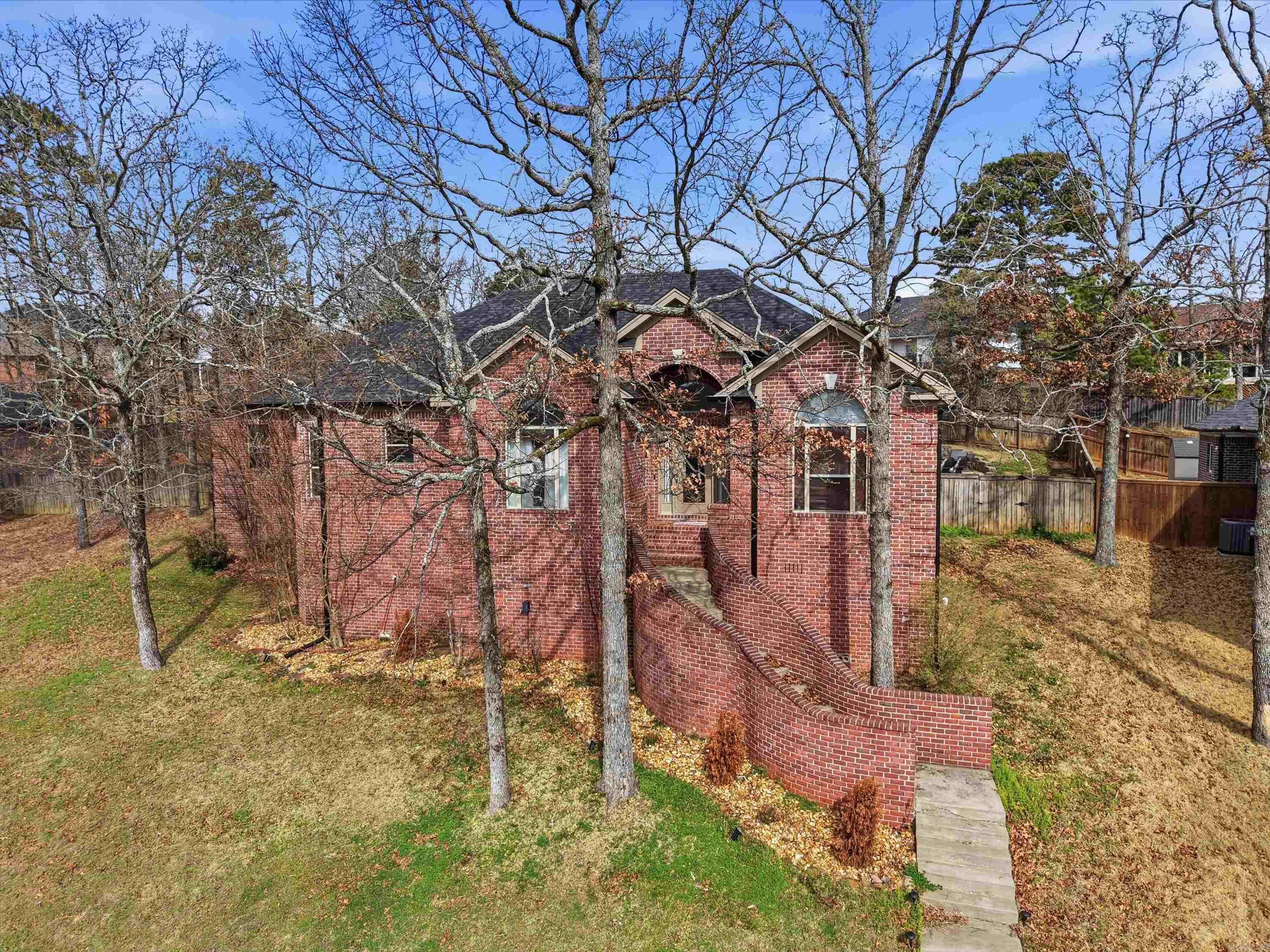 Space, Style, and Summer Fun with your own POOL PARTY!  New Roof and Gutters 2025, HVAC 2022, HWH 2026, New Sand Pump and Pool Liner 2025. Welcome to Maumelle Valley Estates, where this address has it all. Sitting on nearly half an acre, you will love the architectural details, soaring ceilings, and arched entryways that give the home character the moment you walk in. This living room features beautiful tray ceilings and a wall of natural light which flows effortlessly into the spacious kitchen with center island, pantry and breakfast area for entertaining. Don't forget- holiday gatherings are made for this formal dining room with tall ceilings and detailed trim. The primary suite offers generous space and natural light, creating a comfortable retreat at the end of the day.  Step outside and the real fun begins! This backyard is designed for summer living, featuring an in-ground swimming pool, patio space, and room to relax or entertain — all set within a private fenced yard.  Homes like this rarely hit the market- Schedule a showing today
