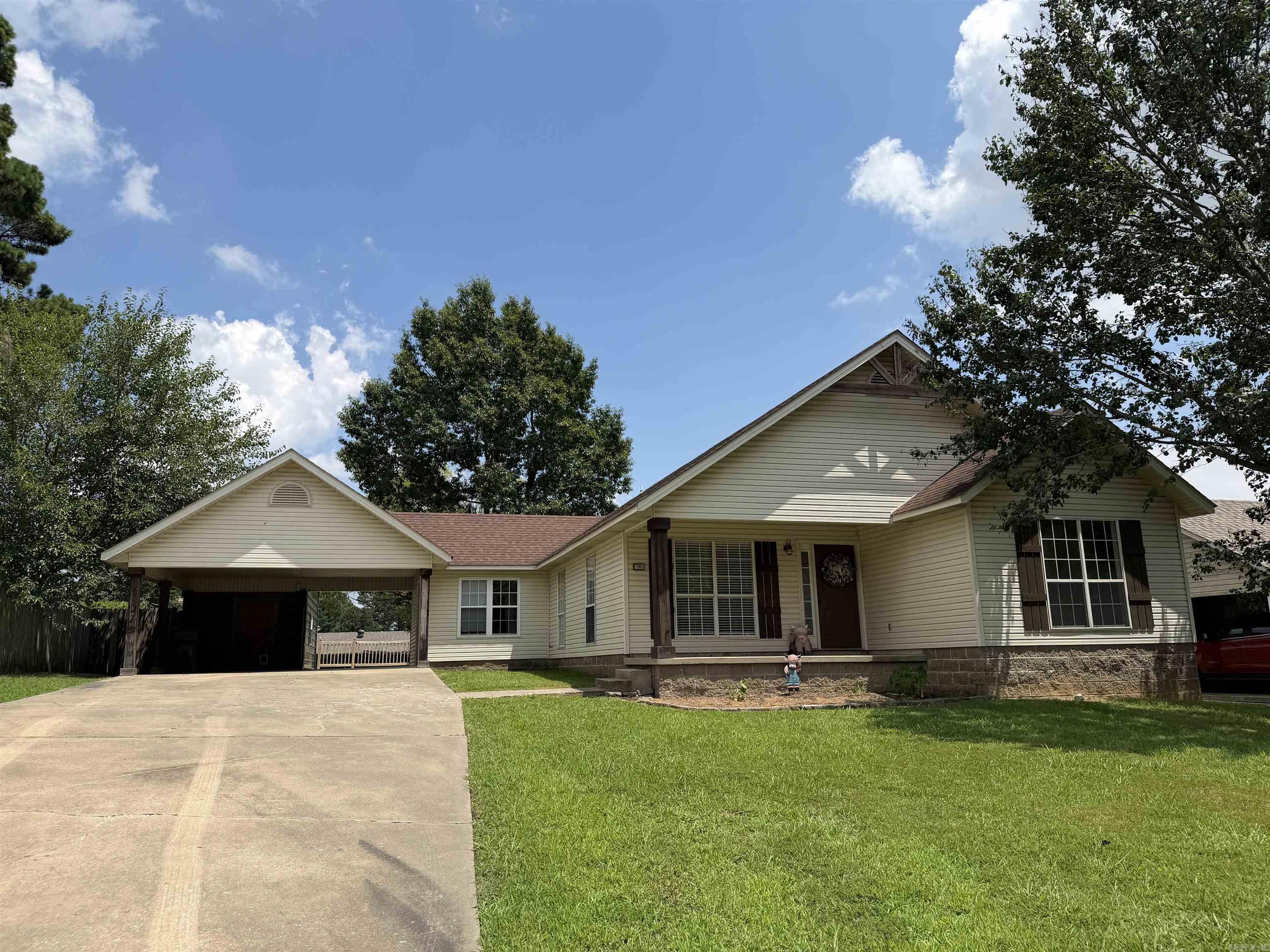 This recently remodeled 3 bedroom, 2 bath home sits in an established subdivision and offers a bright, welcoming feel from the moment you walk in. The fresh paint and updated finishes make the home feel comfortable and inviting, while the formal dining room adds extra space for meals, hosting, or everyday use. You’ll also love the convenient carport access, charming front porch, fenced backyard, wooden deck, and storage building. With a great layout, nice updates, and plenty of usable outdoor space, this home is easy to enjoy and ready to make your own!
