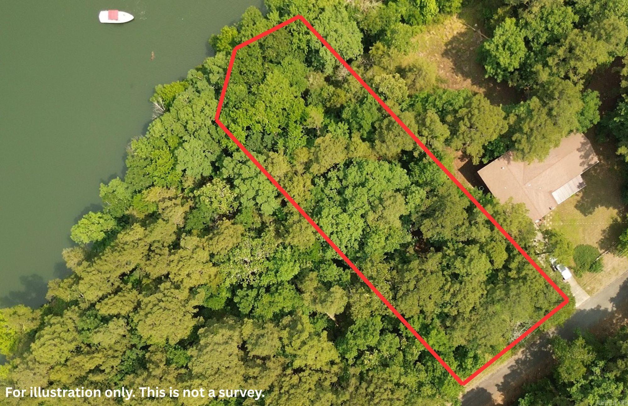 LAKEFRONT/LAKEVIEW at the back of SNAKEHEAD COVE aka Lynn Creek with the white line currently in the water. So, cut the trees to the water if you'd like to open the view. This lot has a good building area with a view of the lake and hill across Lynn Creek. You can walk to the water, but it is steep. The old stairs need replaced. Pull your boat right up to this lot or keep it a short SxS ride down to FFB Marina less than 2 miles away. All utilities, including sewer, are at the road and the taxes and dues are paid up and ready for your new home. REALTOR OWNED