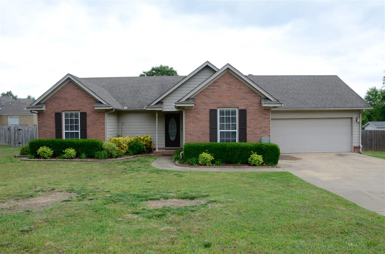 Charming home located in a quiet neighborhood in the Nettleton School District. Family room with vault ceiling, tile floors and fireplace sits right off the entrance. Quaint eat-in kitchen is next door to the family room and has french doors leading to the backyard. Large master suite features tiled shower/tub combo and dual vanity. Additional bedrooms have neutral color schemes and plush carpeting. Other amenities include a laundry room, patio, wood privacy fenced backyard and storage building.