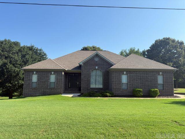 A beautifully maintained one-owner home with over 3,100 square feet nestled in a quiet subdivision in the community of East End.  Conveniently located just 15 minutes from downtown Little Rock. The stunning entryway and great room have 10' ceilings with the great room also showcasing a tray ceiling, built-ins and a woodburning stove.  The light filled formal dining room located right off the foyer has impressive 12' ceilings and additional tray ceiling. The home offers a private primary retreat with jacuzzi tub, separate shower, double vanity, and walk-in closet.  Three additional bedrooms are located on the opposite side of the home. The kitchen has custom cabinets with lots of storage, breakfast bar seating and adjoining breakfast area overlooking the private backyard.  The expansive newly finished basement area offers the perfect space for entertaining with a dry bar, electric fireplace, bathroom and separate flexible space for an office or hobby room.  Another standout feature is the spacious basement workshop and garage, offering areas for DIY enthusiasts or additional storage.