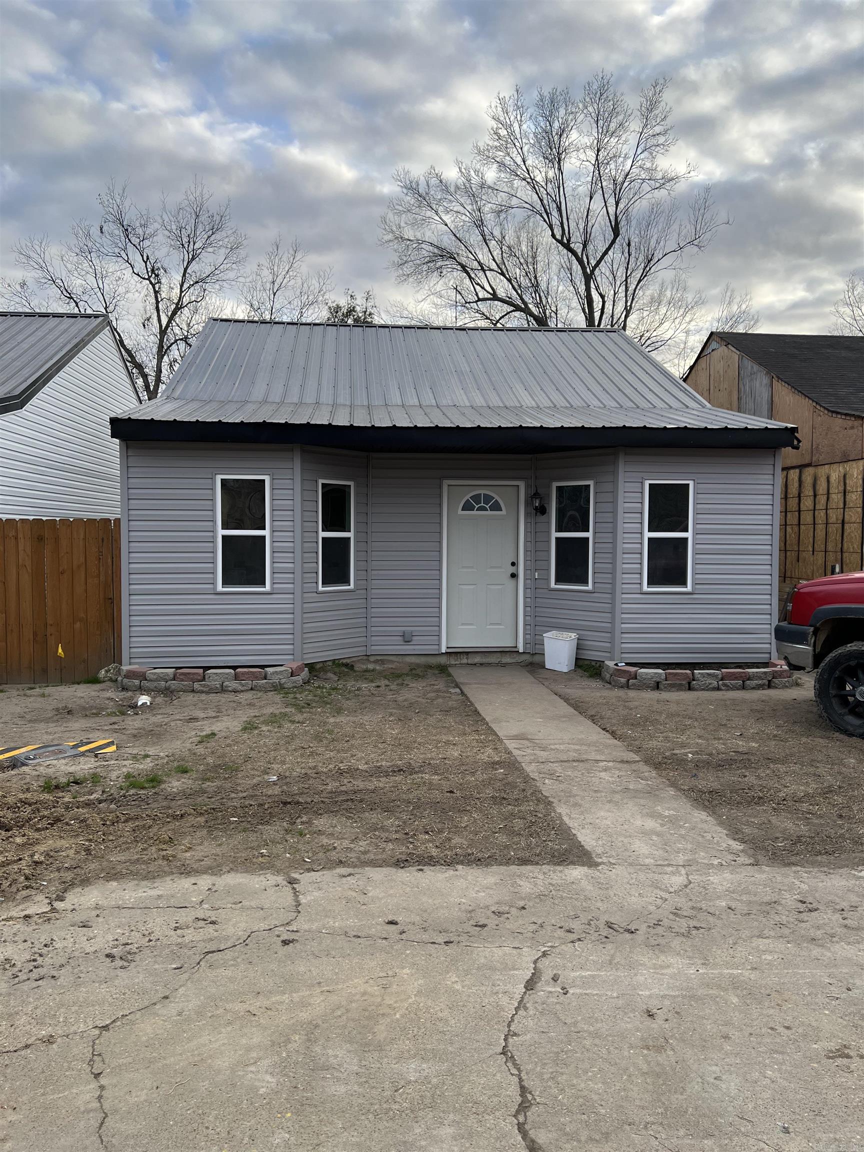 Great investment opportunity in Trumann! This 2-bedroom, 1-bath home has been completely renovated in 2025 and features a durable metal roof for peace of mind. The property is currently occupied by long-term HUD tenants, providing immediate rental income for investors. Can be bought individually or as a package with 121 Mallard and 125 Mallard.