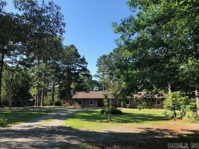 Country Home only 15 minutes to downtown LR. *TWO MASTER SUITES* 4 bed/    3 full bath. BONUS room. Could be made into a 6 bedroom home easily. Very open floor plan. *SUNROOM* Granite throughout. Perfect for horses, chickens, goats, etc. New AC units 2018, New roof 2018 and gutters. There are 2 additional buildings on property for storage or work space.  Home has been remodeled throughout and is ready to move in. *TWO KITCHENS* Additional space for office/sitting area. Nice patio. See showing remarks!