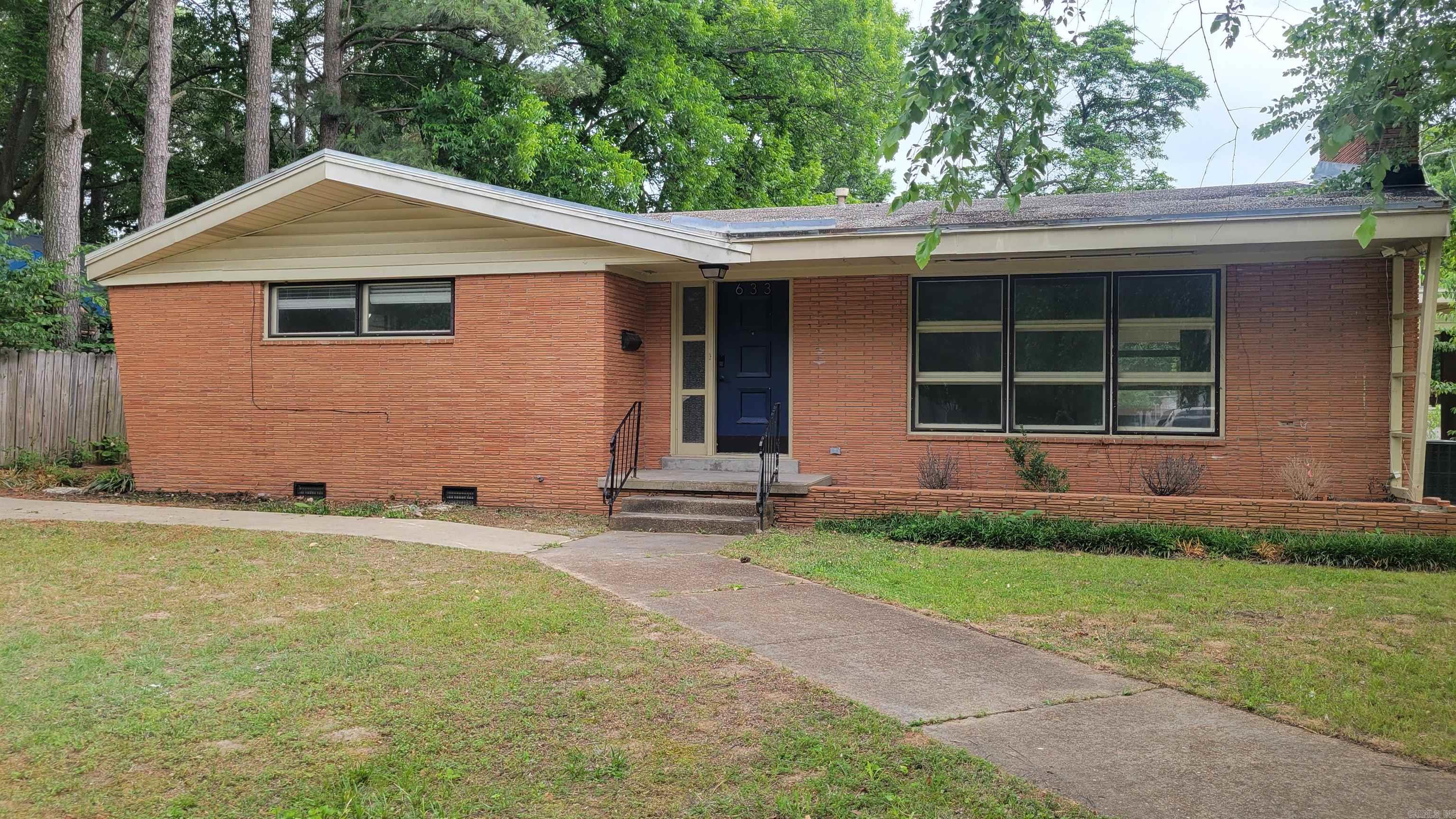 Updated and remodeled in 2022, this charming home offers 3 bedrooms and 2 bathrooms with a functional layout designed for comfortable living. The kitchen features a separate dining area, while the living room includes a cozy gas fireplace. Additional highlights include a separate laundry area, one-car carport, and an extra driveway for additional parking. Enjoy outdoor living with a screened porch and a fenced backyard situated on a spacious corner lot. Newly painted interior.
