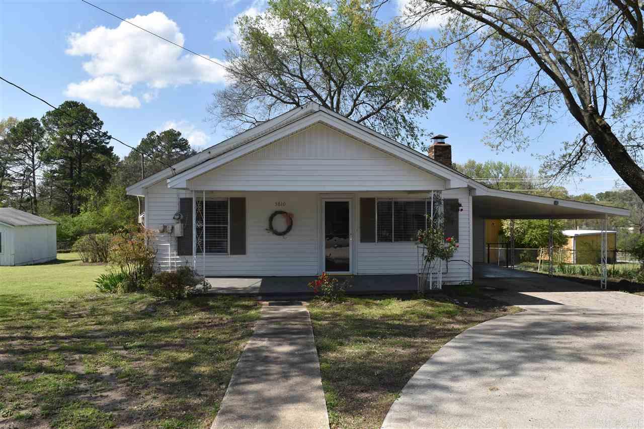2 bedroom 1 bath home on .60 acre lot with storm cellar and shop. This house has been remodeled and is move-in ready. Open floorplan in living room, dining and kitchen. Woodburning fireplace in family room. Island in kitchen. New flooring and paint throughout. Partially fenced with shop in rear of house.