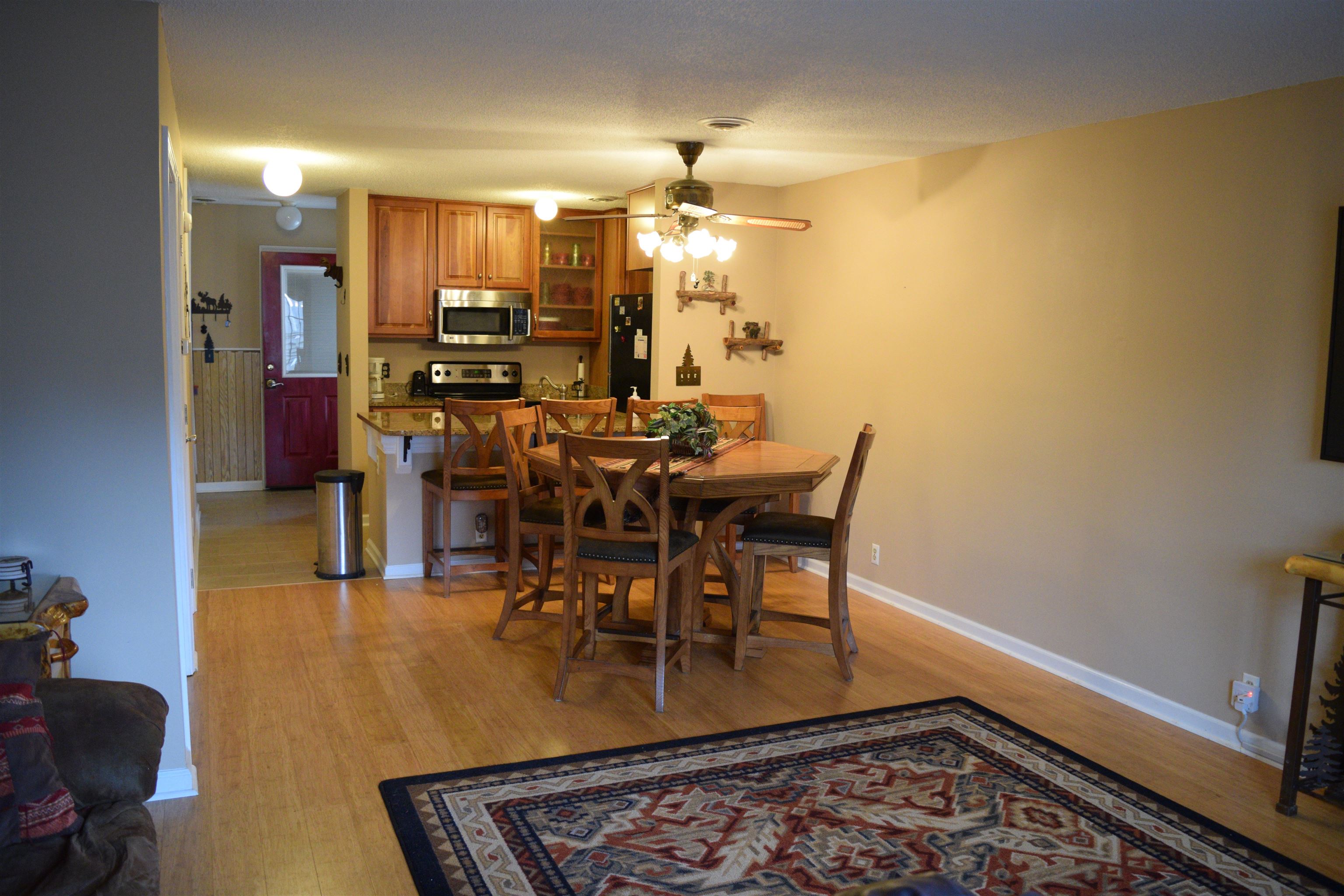 This beautiful condo is being offered fully furnished! There is a ton of potential for this condo!! Could be a short term rental!! Lodge Themed 2 bedroom and 1.5 bath Lakewood Hills! These condos have their very own private pool. Great Location walking distance to most area city center amenities! Come take a look!