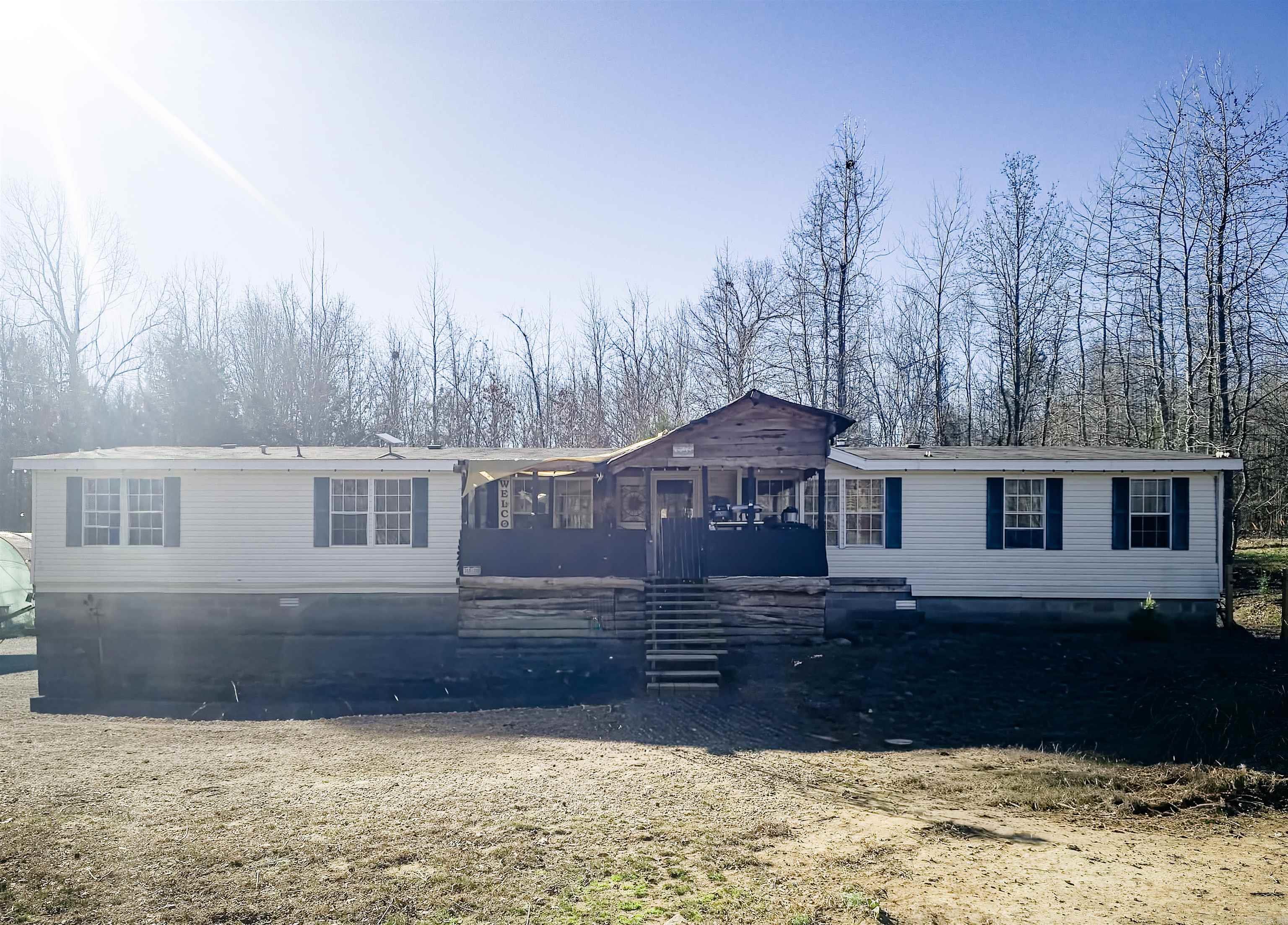 If you are looking for a private, peaceful country retreat in the Ozarks, you don't want to overlook this one! The home is situated towards the front of a 5-acre tract of land that offers a large pond and both cleared and wooded land.   Inside, you find a wonderful open-concept living space with a split floor plan. There is sufficient room to create an eat-in kitchen area in addition to the full dining room!! The primary ensuite features a soaker tub separate from the shower, as well as a large walk-in closet. Two of the bedrooms are separated by a Jack-and-Jill-style bathroom, while the 3rd full bath in the hall connects to the 4th bedroom.   Just 10 minutes from Fox, 15 minutes from Shirley, and 20 minutes from Mountain View, you are remote but not too far away from schools and stores, and fiber is currently being installed in the area!
