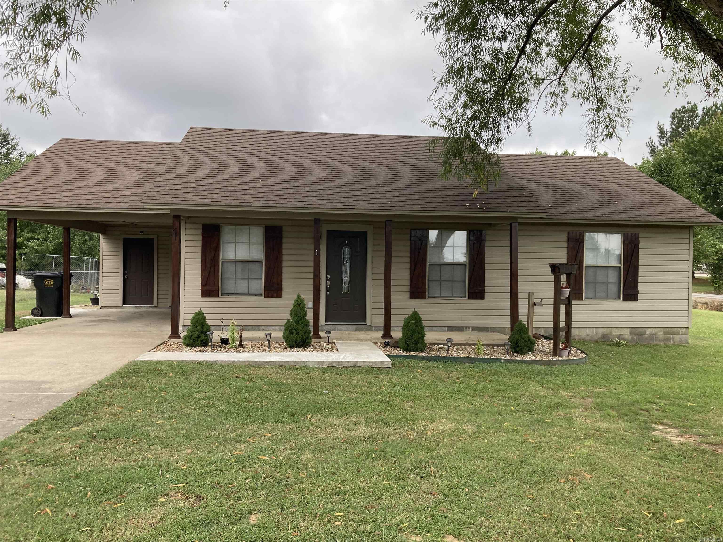 Welcoming 3 bedroom, 2 bathroom house on a large corner lot. Covered front porch perfect for relaxing and watching the sunset. Hard floors in the living room and kitchen, stainless steel appliances, separate laundry area, storage room off of the carport and a 10x12 storage shed/workspace with electricity! This house has so many updates and is ready to be your home today!
