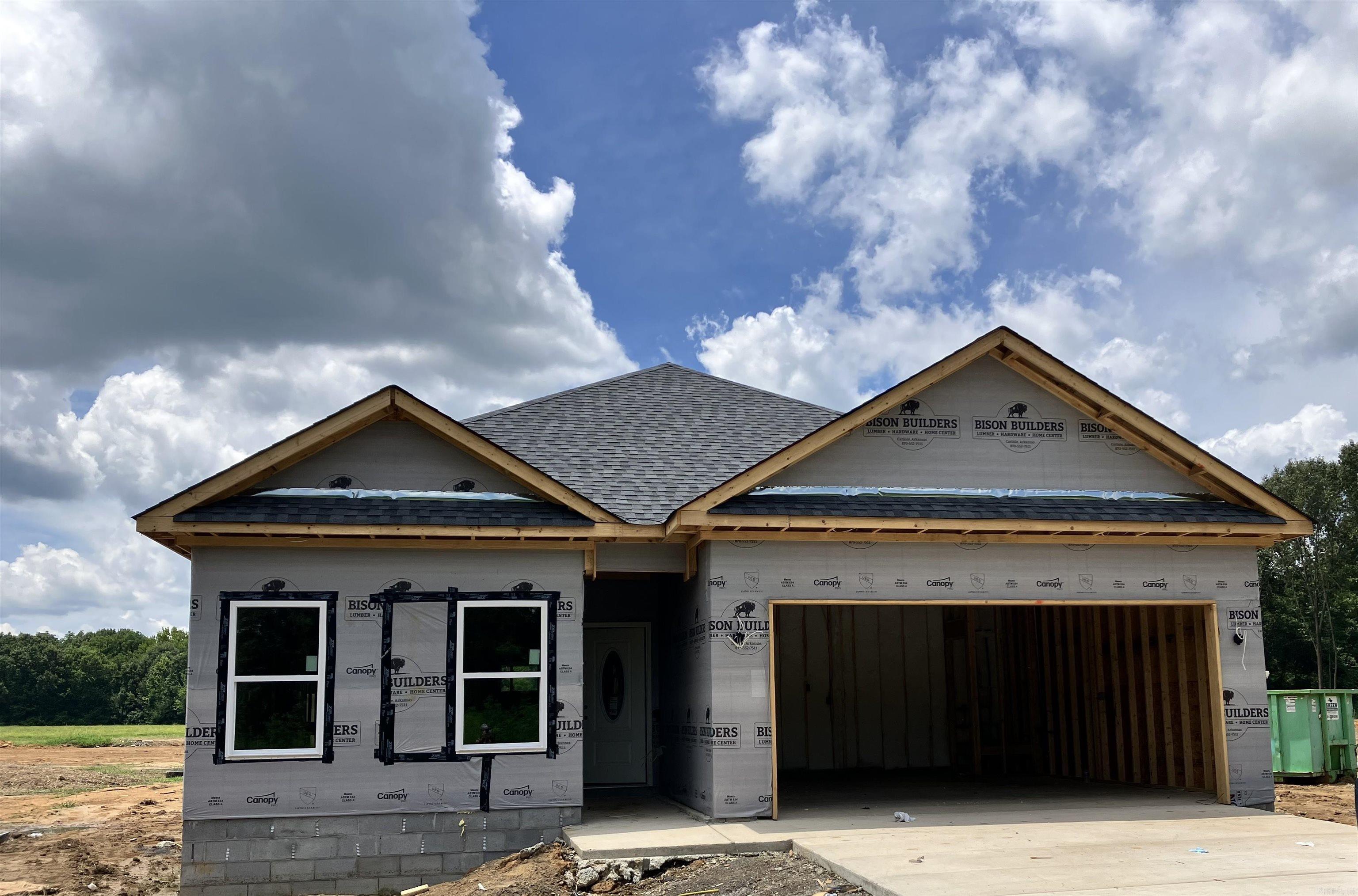 Coming soon from Southern Charm Custom Homes —Get this brand new brick beauty in Beebe locked down under Contract packed with style, upgrades, and buyer incentives! This 3-bedroom, 2-bath new construction home offers approximately 1,330 sq. ft. of thoughtfully designed living space which will boast a spectacular double pan ceiling. Specification sheet & plan available. Quality renderings will showcase luxury flooring, quartz kitchen countertops, a marble walk-in rain-head primary shower, walk-in closet, tilt-sash windows, soft-close cabinetry with hardware, elegant lighting, remote-controlled interior and exterior ceiling fans, and more. To make the move even sweeter, the builder is offering $3,000 toward closing costs, a boosted appliance package in addition to the standard appliances (Stove, Dishwasher, Disposal) with name-brand refrigerator, washer, dryer, and smart 65” TV, plus a 2/10 home warranty. Quality finishes, real incentives, and peace of mind — don’t wait until it’s finished to make your move.