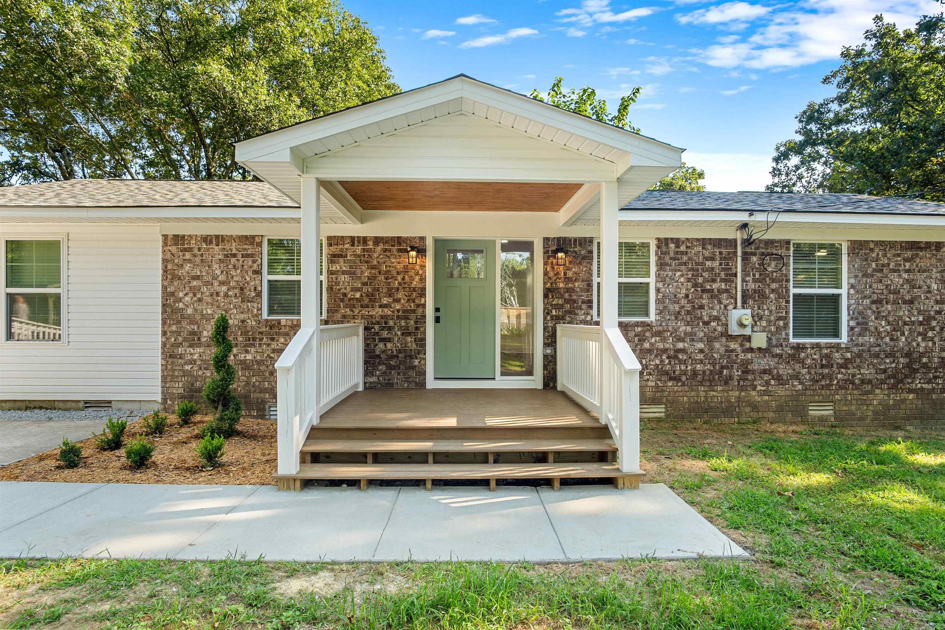Enjoy peaceful country living just minutes from town! This beautifully renovated 4-bedroom, 2-bath home offers 1,490± sq. ft. plus a bonus sun room and 20'x25' shop,  all situated on 1.39 acres just outside the Cabot city limits. This all-electric home features new appliances, new luxury vinyl plank flooring, carpet, and tile throughout, new windows, and updated plumbing and electrical. The kitchen boasts new cabinets, granite countertops with a breakfast bar, pantry, and modern finishes. Both bathrooms include double vanities and tiled tub surrounds. Built-in closet organizers provide added storage in the bedrooms. Step outside to enjoy the spacious yard, mature landscaping and oak trees, a charming goldfish pond, rustic chicken coop, and a detached shop perfect for hobbies, storage, or a workshop. With recent updates, modern amenities, and a quiet rural setting, this move-in-ready property offers the perfect blend of comfort, style, and country living. Agents see remarks regarding showing instructions and associated docs.