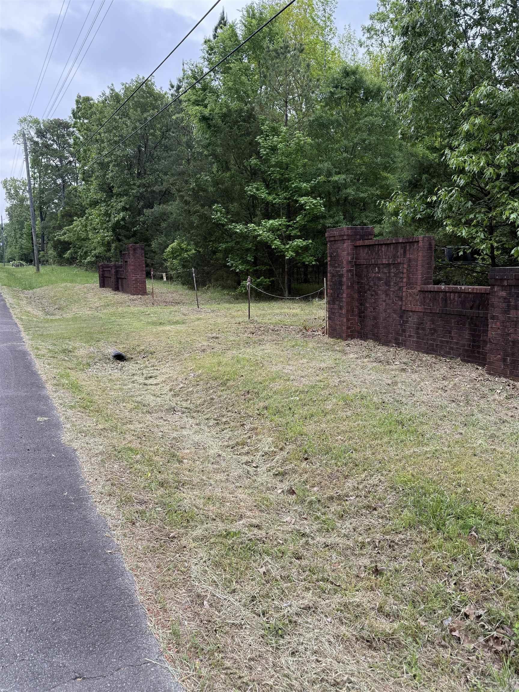 This is a beautiful parcel of property that is walking distance to Heber Springs Recreation area, close to Heber Marina and Greers Ferry Lake. The layout of the land would be very conducive for development. Heber Springs Water Department is installing a six inch water line along with water hydrants on the property side of Harbor Hill Road at the time of this update. Owner financing may be available. Survey of potential lots available.
