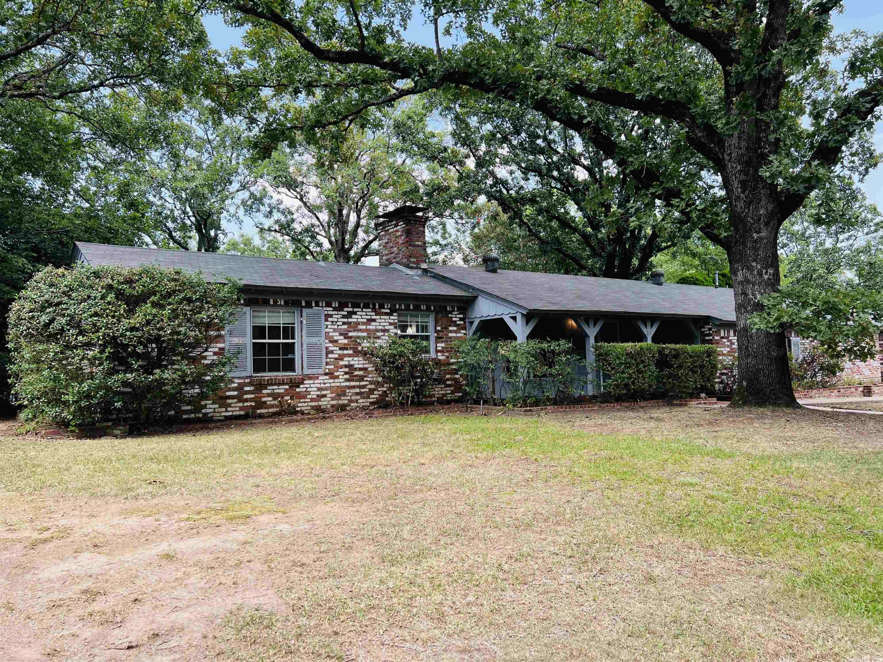 SO MUCH POTENTIAL!! This is a rare Park Hill gem. The main house is 1702sqft. Split floor plan with two guest rooms on one side and a complete master suite on the other. Two gas fireplaces. Two separate living room spaces in the main house. The back patio is like its own private oasis with a fully gated pool just in time for this Arkansas summer. Separate from the main house is a 624sqft 1bed 1bath patio style home that is perfect for guests. Home has been well maintained. Just needs a little updating.