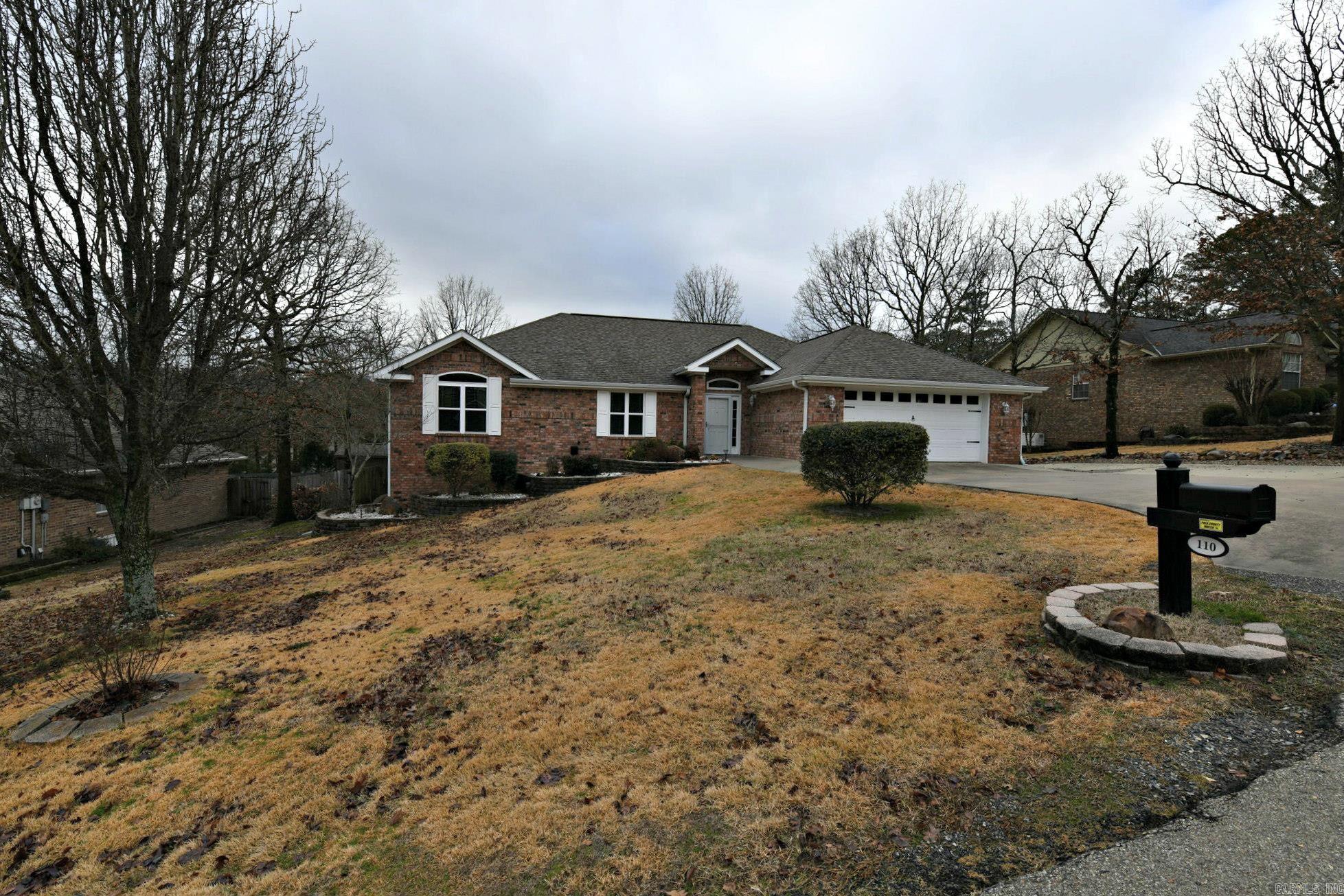 Updated home with newer flooring, windows.  3 bedroom, 2 bath plus an office.  Storage building. Nice walk-in, tiled shower.