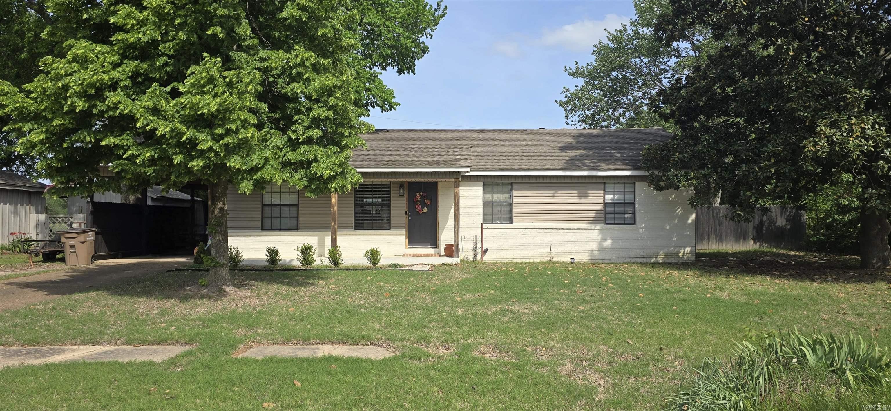 Well-maintained 2-bedroom, 1-bath home in a convenient location near schools. This inviting property offers an open floor plan with a dining/kitchen combo with breakfast bar and a separate dining area that can easily be converted back into a third bedroom if desired. Step outside to enjoy the wood deck overlooking a large, fenced in backyard with storage shed. With flexible living space and great outdoor amenities, this home is ideal for a variety of lifestyles.