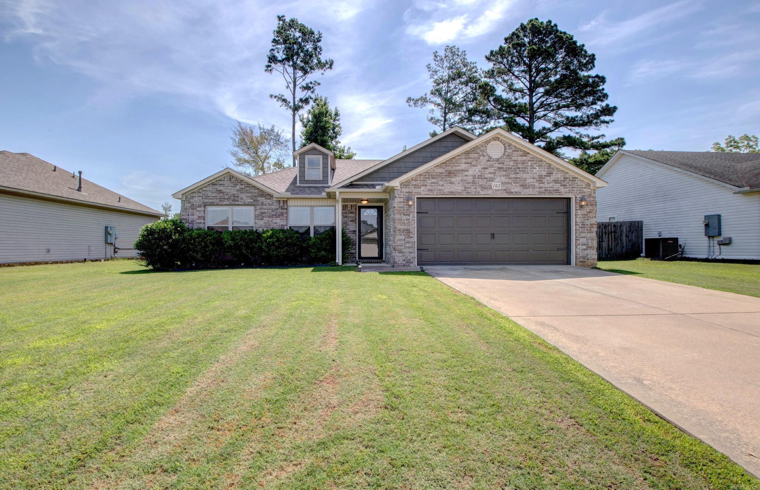 Welcome home to this well-maintained 3-bedroom, 2-bath residence conveniently located in Jacksonville! This charming home offers a functional floor plan with comfortable living spaces, a spacious kitchen, and plenty of room for everyday living and entertaining. Recent updates provide added peace of mind, including a new roof installed in 2023 and a new garage door installed in 2023. The large backyard offers space for outdoor activities, pets, gardening, or simply relaxing. Conveniently located near schools, shopping, dining, and easy access to Little Rock Air Force Base, this home is a great opportunity for first-time buyers, downsizers, or anyone looking for a move-in ready property. Don't miss your chance to make this Jacksonville home yours—schedule your showing today!