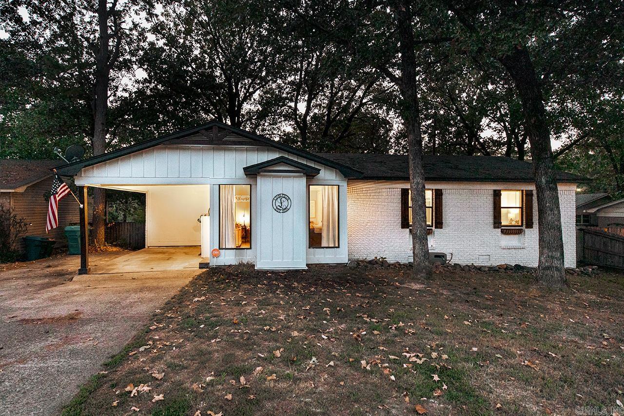 Adorable farmhouse on a quiet cul-de-sac street in West Little Rock! Large, privacy fenced yard with covered deck and firepit space. Spacious open floor plan with a large living and dining room that opens to the kitchen featuring stainless steel appliances and quartz countertops. 3 bedrooms, 2 full baths including a master en-suite. Conveniently located to restaurants, shopping, UAMS, Baptist, Arkansas Heart Hospital and more! Agents Please See Remarks.