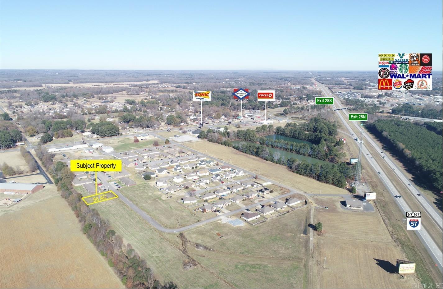 Zoned R-3, cleared & ready for development! .56 Acre multi family lot located just off I-57 & Highway 64, with quick access to shopping & retail! Area benefits from new construction including: Starbucks, Seven Brew, & Mi Ranchito. Surrounded by a residential subdivision & multi family units.  Population of 10,661 in a 3 mile radius & 16,000 VPD on highway 64. Call today for more details!
