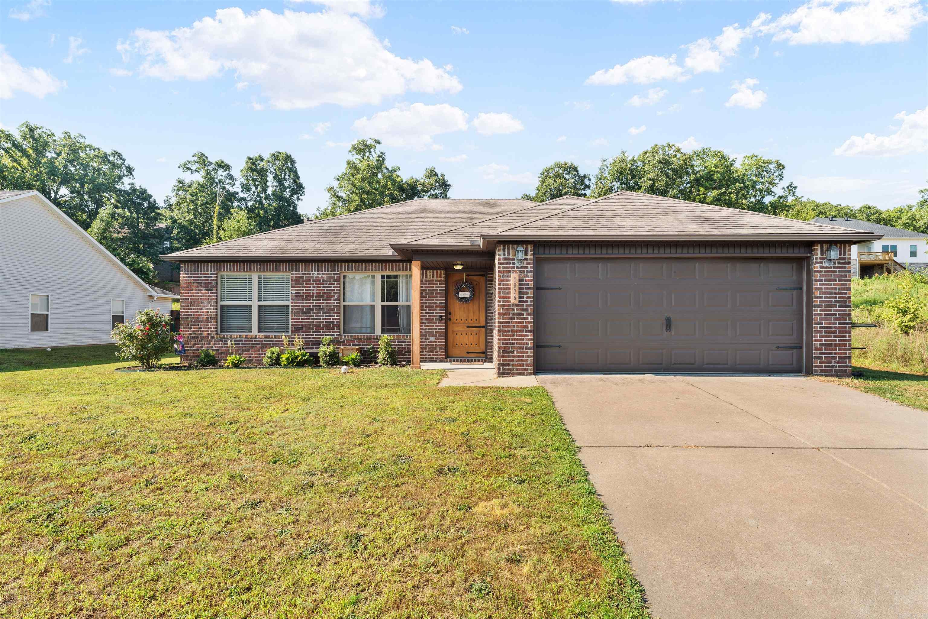 If you're looking for the perfect combination of comfort, convenience, and outdoor living, this charming home is a must-see!  This well-maintained 3-bedroom, 2-bathroom home offers 1,347 square feet of thoughtfully designed living space in a quiet, established neighborhood just outside the heart of Conway. Enjoy the peaceful setting while still being only minutes from shopping, dining, schools, and interstate access.  Step outside and you'll find one of this property's standout features—a spacious covered back porch with a beautiful pergola, creating the perfect place to relax, entertain guests, or enjoy your morning coffee. The backyard also includes a shop, providing plenty of room for hobbies, storage, woodworking, or your next project.  Whether you're a first-time homebuyer, looking to downsize, or simply searching for a home in a peaceful neighborhood with great outdoor amenities, 1975 Shadow Ridge Road offers exceptional value and a place you'll be proud to call home.  1975 Shadow Ridge Road | Conway, AR  3 Bedrooms 2 Bathrooms 1,347 Sq. Ft.  Spacious Shop