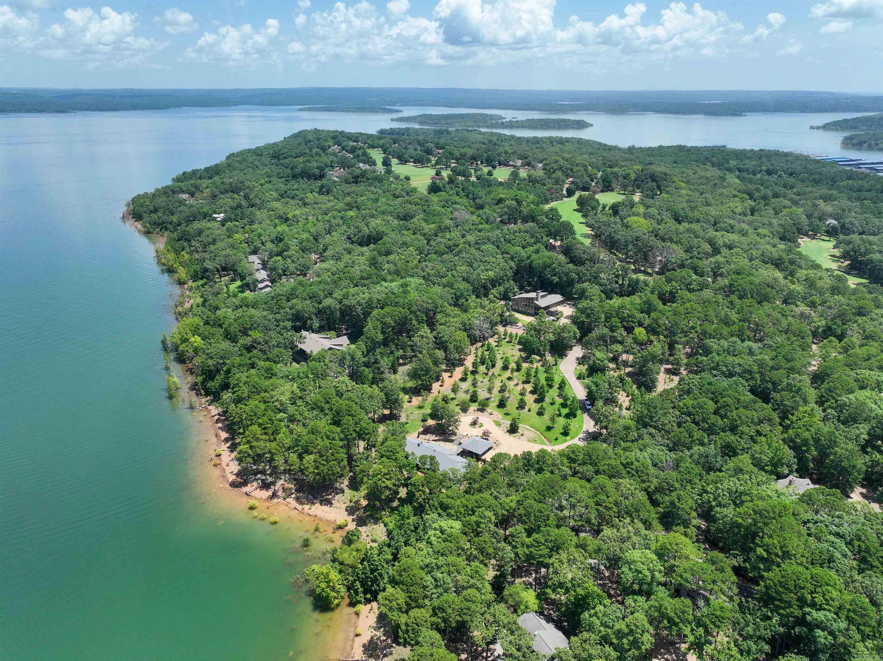 LAKEFRONT LOT ON EDEN ISLE with 130 feet of lake frontage!!!  This 1.04 acre lake lot on Eden Isle is absolutely ready to go!  Sewer, water, gas and electric are all ready!  Great lake views and easy walk to the water.  Gorgeous sunsets and lots of room between neighbors, this is one of the last lake lots left on the island!