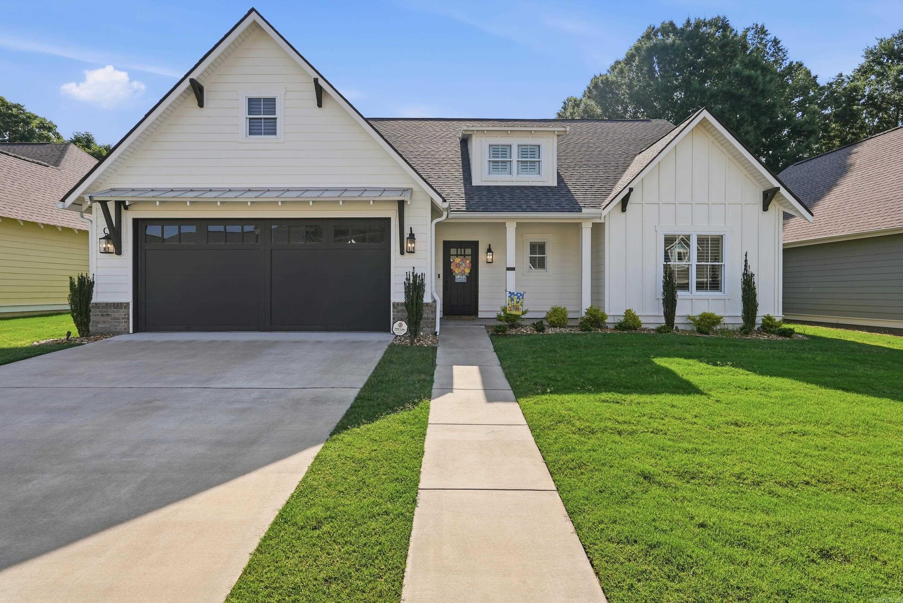 Welcome to this rare opportunity to live in the highly desired Woodland Cove, 55+ community in Conway!!  This beautifully appointed Craftsman-style home nestled on a quiet cul-de-sac was built in 2022 and features a thoughtfully designed split floor plan that combines comfort, style, and functionality. The open-concept living space showcases luxury vinyl flooring, custom built-ins, custom plantation shutters, and a seamless flow between the living, dining, and kitchen areas. The well-appointed kitchen highlights include quartz countertops, a large island with bar seating, premium Bosch appliances including a coordinating refrigerator that also conveys with the home.  With cozy covered porches, an adorable mudroom/laundry room combo, and even ADA accessibility, this home offers so much versatility. Did I mention the new owners will enjoy a low maintenance lifestyle with the HOA taking care of all the yard maintenance?!?  Schedule your private showing today!