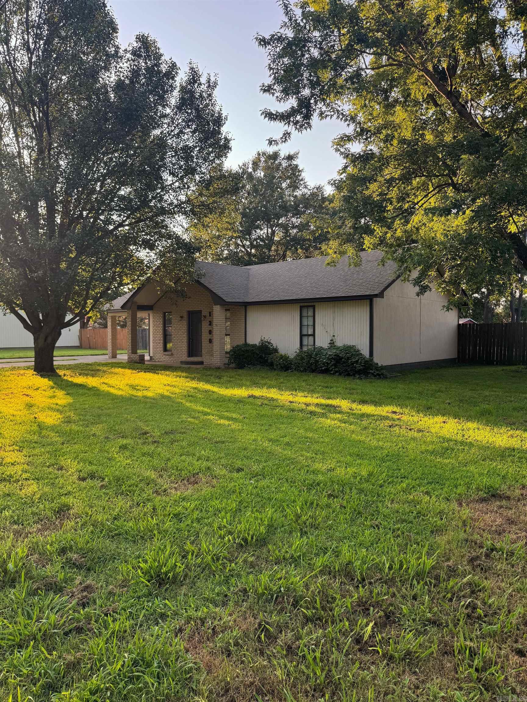 Beautifully maintained 3-bedroom, 2-bath home in the heart of Trumann offering the space, updates, and location today's buyers are looking for. Features include 1450 square feet with an open-concept floor plan, and quality finishes throughout. Recent upgrades include a new roof as of 2024 giving peace of mind and protection. An added-on room at the back of the house provides the perfect setup for a home gym or game room. Step outside to a spacious backyard, out of a total 0.49 acres, with a large patio perfect for entertaining. Enjoy a welcoming neighborhood with friendly neighbors while being just 10 minutes from Jonesboro and 15 minutes from Arkansas State University. The photos are great, but this home truly feels even better in person. Schedule your private showing today and see everything this home has to offer!