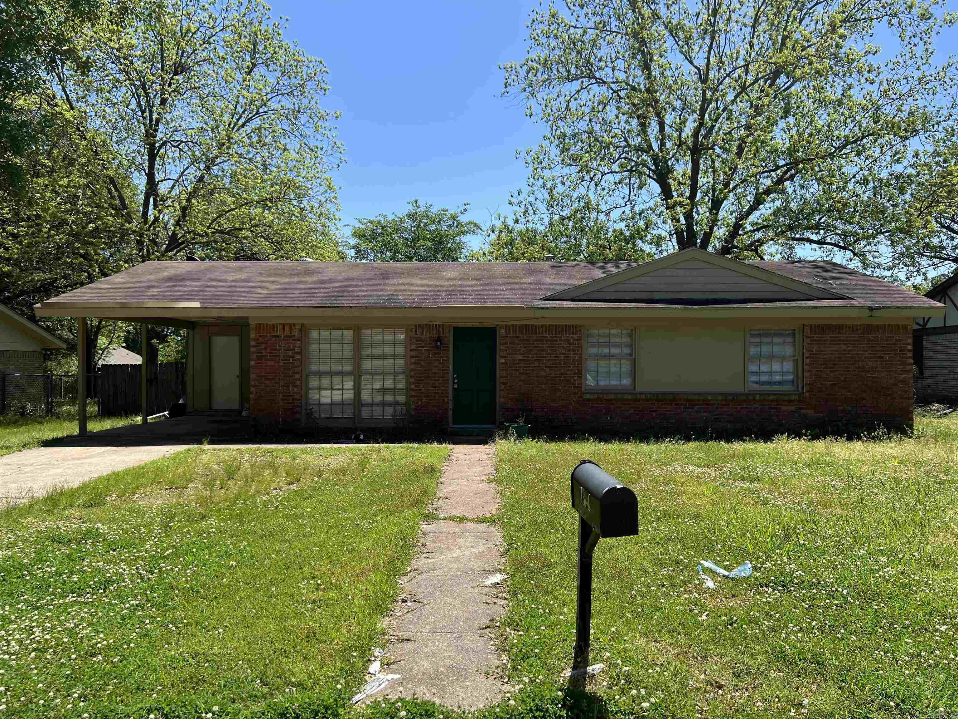 Come see this three bedroom, two bath home in Texarkana, AR. You will love the second living area with a wood burning stove and built in serving area. This is a great space for entertaining! The covered patio looks into a big back yard. This would be a perfect home for a first time buyer, someone looking to downsize, or investors. Call to schedule your showing today!