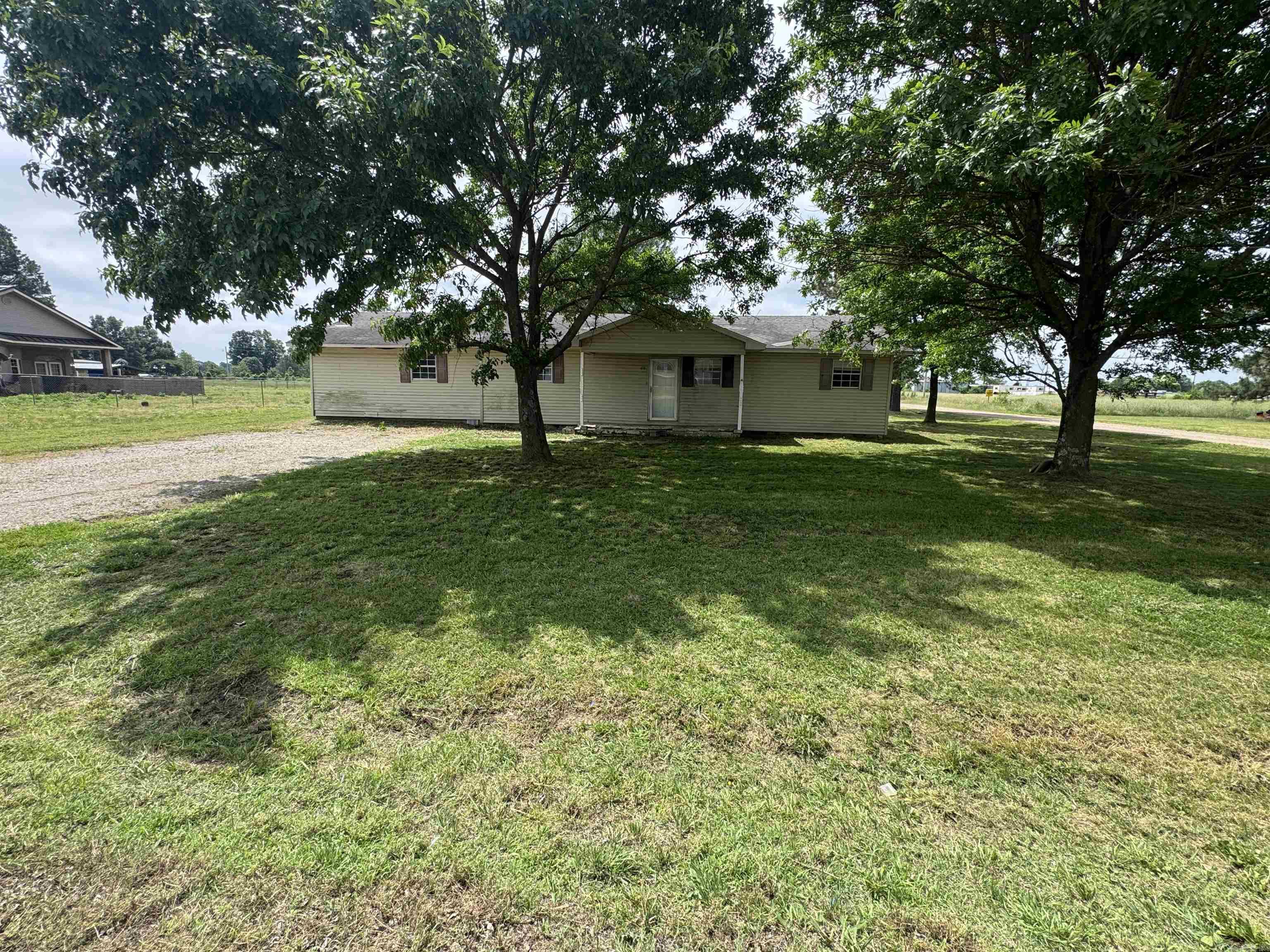 Opportunity is knocking with this spacious 4 bedroom 2 bath fixer upper sitting on a .48 corner lot in a quiet neighborhood. This home offers plenty of space inside and out, along with an 18x20 metal shop. With a little vision and TLC, this property could be a great home. Whether you're looking for investment property or a place to fix up for yourself, this one has tons of potential.