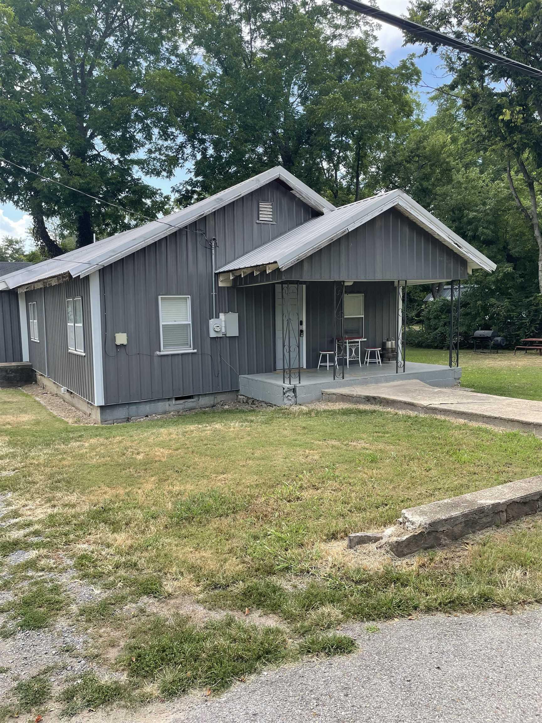 Beautifully updated 1,252 sq ft, 3 bedroom, 2 bath home in the heart of Marshall, Arkansas. Located just off the historic courthouse square and minutes from the Buffalo National River. This home features an open floor plan with new flooring, modern kitchen with stainless steel appliances, updated bathrooms, fresh paint, and move-in ready condition.  This property is a very busy nightly rental.  Spacious bedrooms, and abundant natural light throughout. Level yard with shade trees, firepit, and space for outdoor entertaining. City utilities, high-speed internet available, and easy access to local dining, shopping, and schools.  Perfect for full-time living, vacation home, or short-term rental investment.