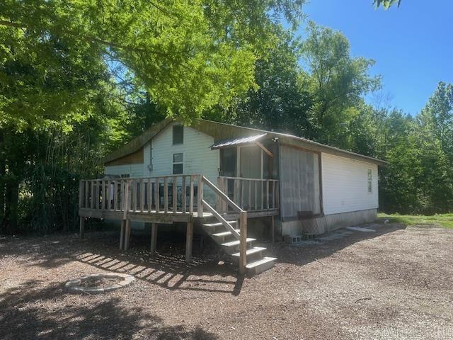Escape to the river with this fully furnished duck hunting and fishing cabin on the St. Francis River! This 2 bedroom, 1 bath retreat offers the perfect blend of relaxation and outdoor adventure. Enjoy peaceful mornings and river views from the deck, or head straight to the water from your private floating boat dock. Inside, the cabin features a tub/shower combo and comes complete with all appliances and furniture remaining making it truly move-in or getaway ready. Whether you're searching for a hunting camp, fishing retreat, weekend escape, or investment opportunity, this riverfront property is ready for memories to be made!