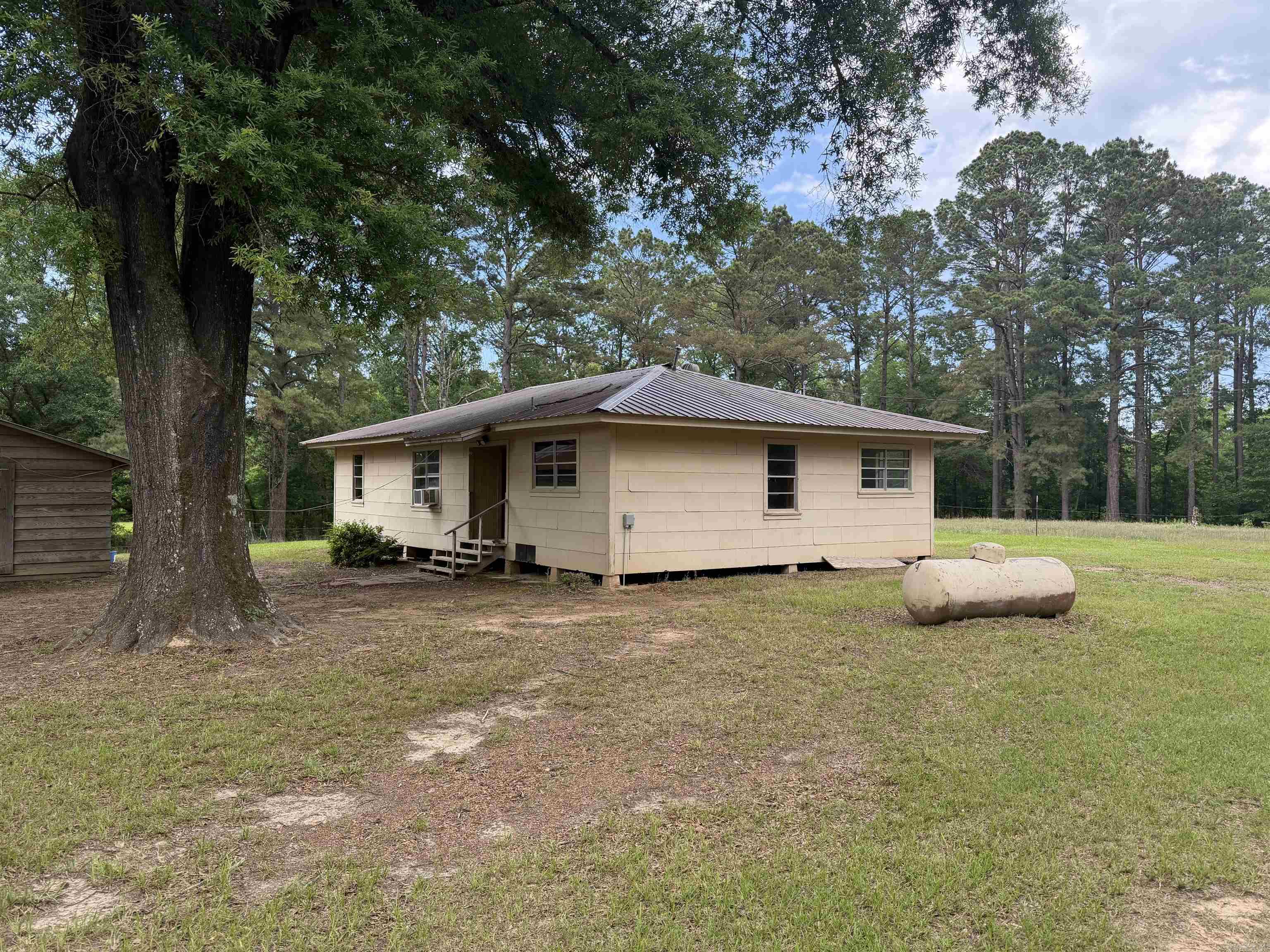 This 3 bed, 1 bath home built in 1985 offering approximately 1,296 sq ft of living space. This property is move-in ready with plenty of potential to make it your own. Situated on 8.25 acres, it provides space to enjoy country living along with a small shed for added storage. Great opportunity for homeowners or investors alike!