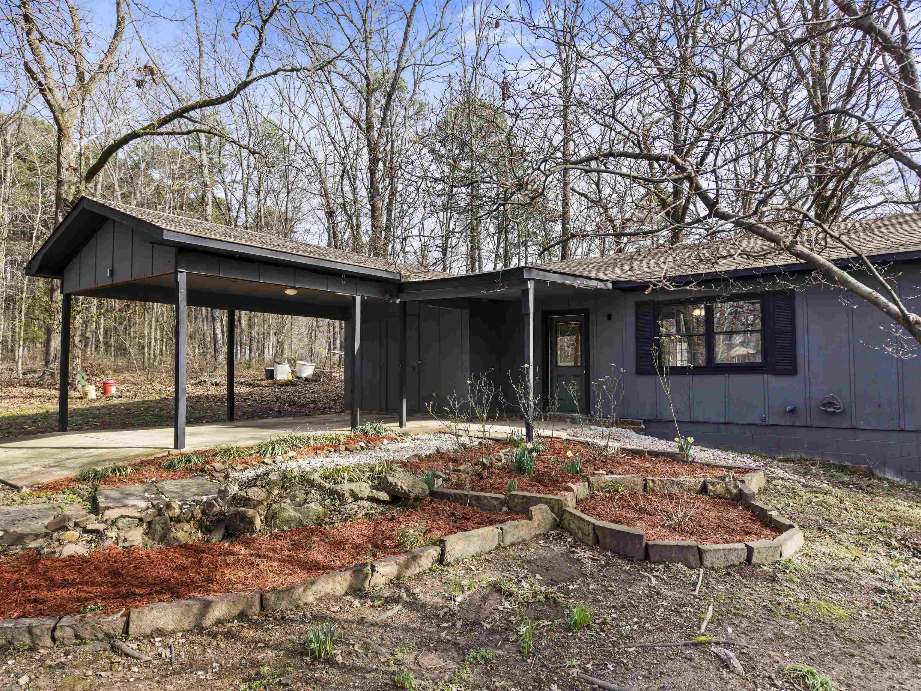 Charming 3-bedroom, 2-bath home tucked away at the end of a quiet neighborhood on under one acre.  This property offers the perfect blend of privacy and convenience, with plenty of space to enjoy outdoor living, gardening, or future expansion. Inside, you’ll find a comfortable layout that’s truly move-in ready as it is, while still offering great potential to update and customize to your personal style. Whether you’re a first-time buyer, downsizing, or looking for a property with room to grow, this home provides flexibility and value. Enjoy peaceful surroundings while being just minutes from Lake Hamilton School, making daily routines simple and convenient. Schedule a showing today.
