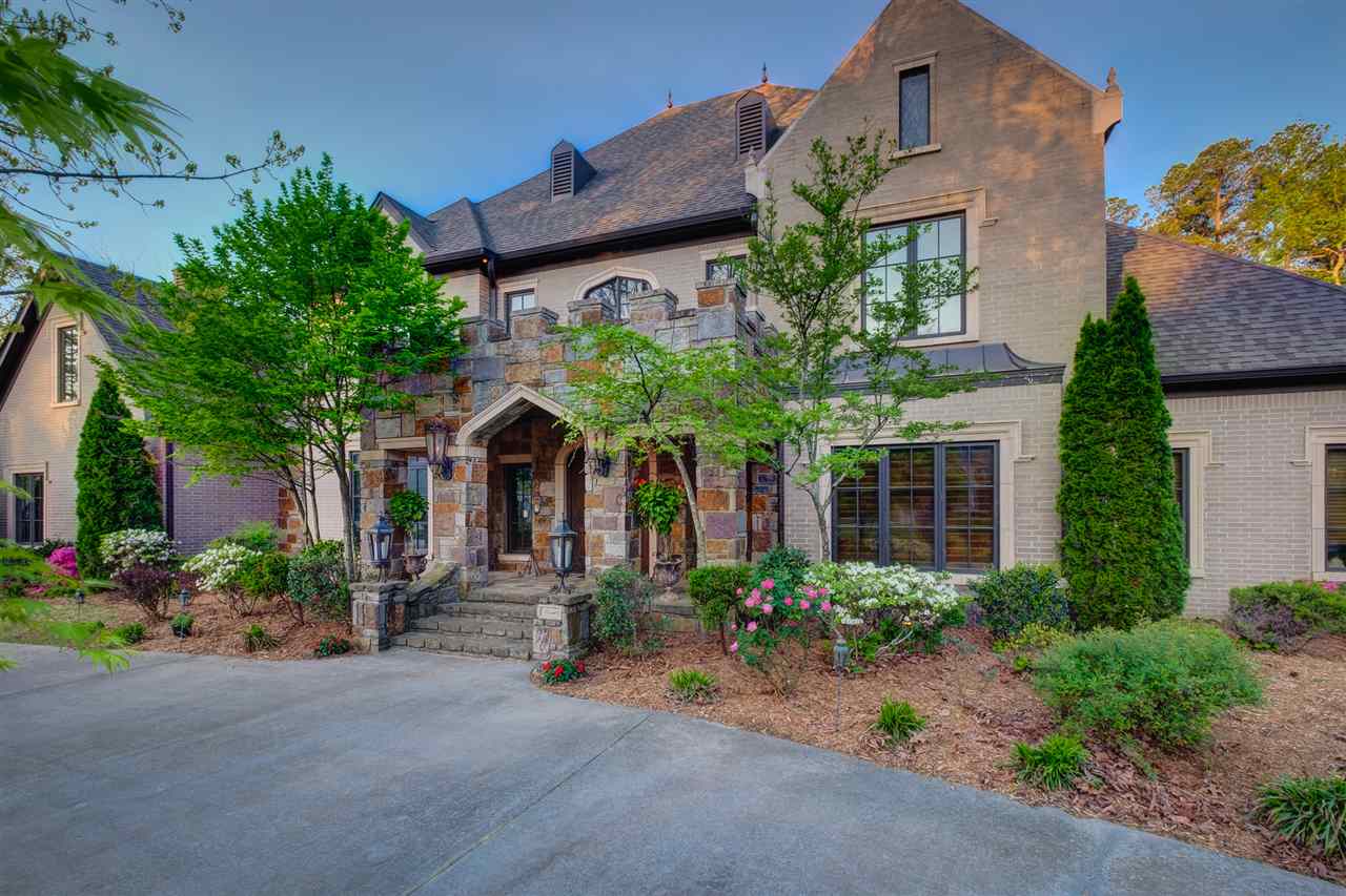 Walk into this amazing 2 story foyer. Continue through to see a stunning pool and backyard complete with waterfall, custom bed, hot tub and covered porches. Gourmet kitchen with 2 dishwashers, SONIC ice machine, warmer, SS double ovens which is central to the FR and LR. An entertainers paradise with so many great features. Master on 1st floor is so spacious and warm. Leads into Huge bath with laundry room which is a FEMA safe room. Upstairs-plenty of rooms for your kids and guests. Come see this beauty