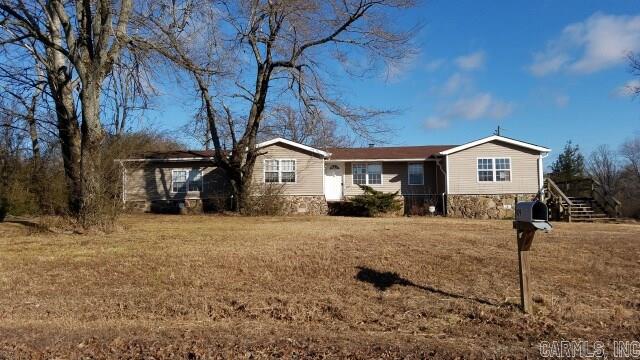 Good 2 bedroom, 2 bath house sitting on 1.54 acres.  There is a well house and additional building on property.  It appears to be on propane gas and well water and septic.  The living room is a good size and has a wood burning stove.  Buyer to turn on utilities at buyers expense for inspection and appraisal.  $1,000 earnest money required on all offers as well as proof of funds or loan approval letter with offers.