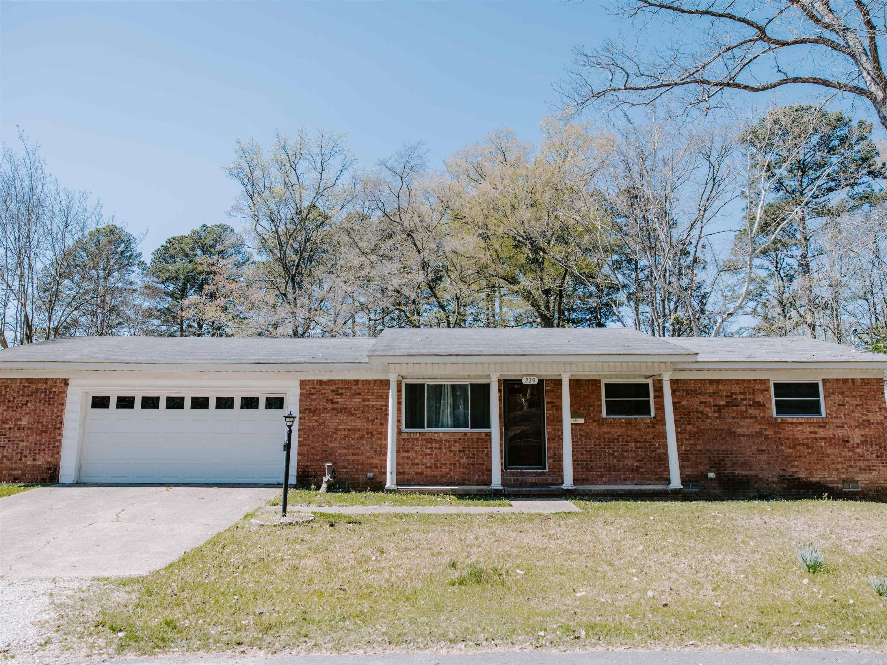 Located on a dead-end street, this 3-bedroom home is ready for the new owners. A large den with beautiful windows sits off the living room/dining room area allowing for large entertainment area sitting on three lots.  The back porch is a great place to relax or raising plants and the large fenced in yard allows for a garden space and play area. Close to all amenities of town but still has a country feel to it.  Updated features include a vapor barrier, new electrical panel, and partially new plumbing. This one is priced to sell, call today for a showing.