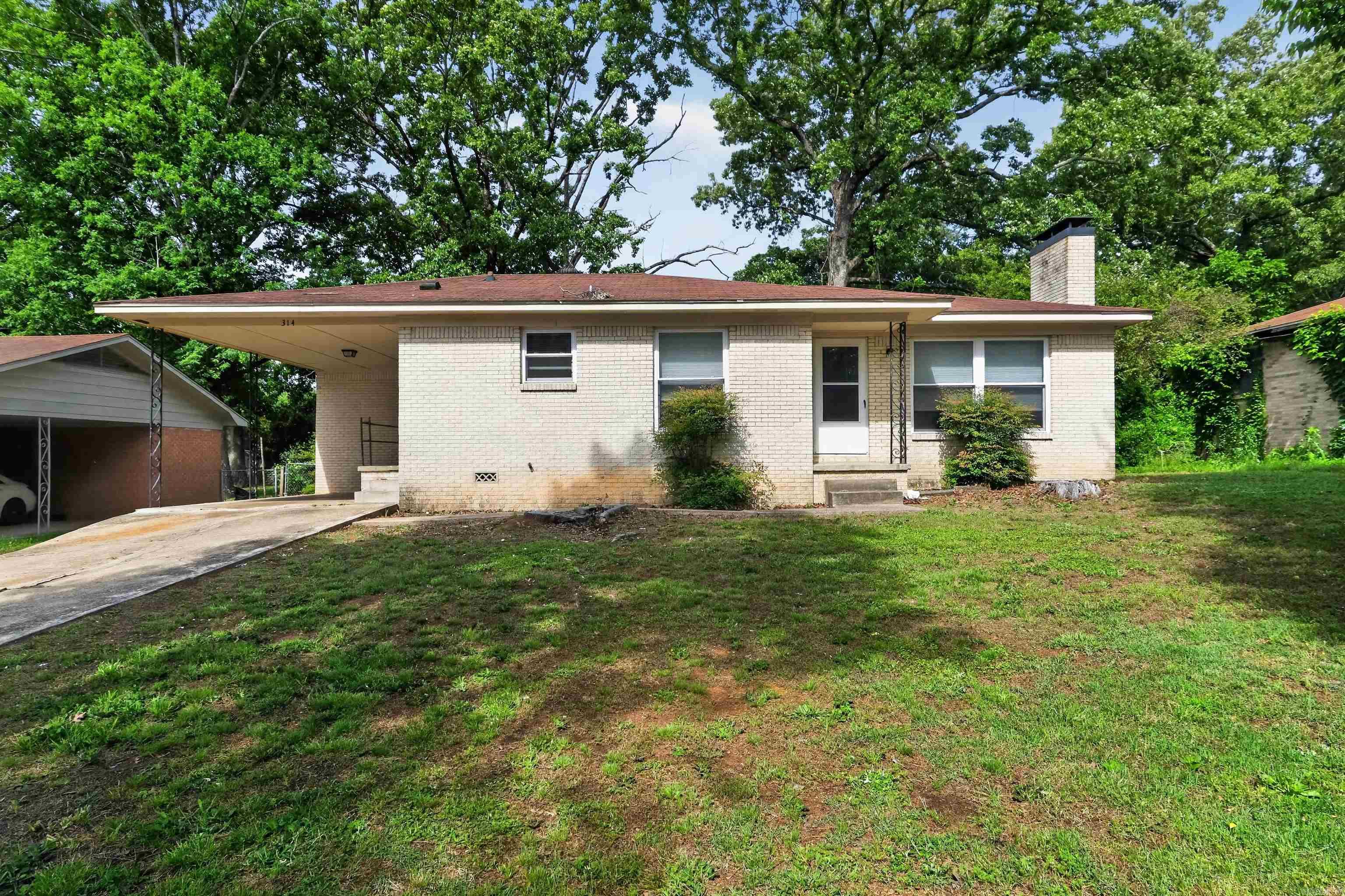 Charming single-story home nestled on a quiet street in an established Little Rock neighborhood. This well-maintained property offers a comfortable layout with spacious living areas filled with natural light. The kitchen provides ample cabinet space and flows easily into the dining area, making it ideal for everyday living or entertaining. Bedrooms are generously sized, and the home features practical finishes throughout. Outside, enjoy a sizable yard with plenty of room for outdoor activities, gardening, or future enhancements. Conveniently located near shopping, dining, schools, and major roadways, this home offers both comfort and accessibility.
