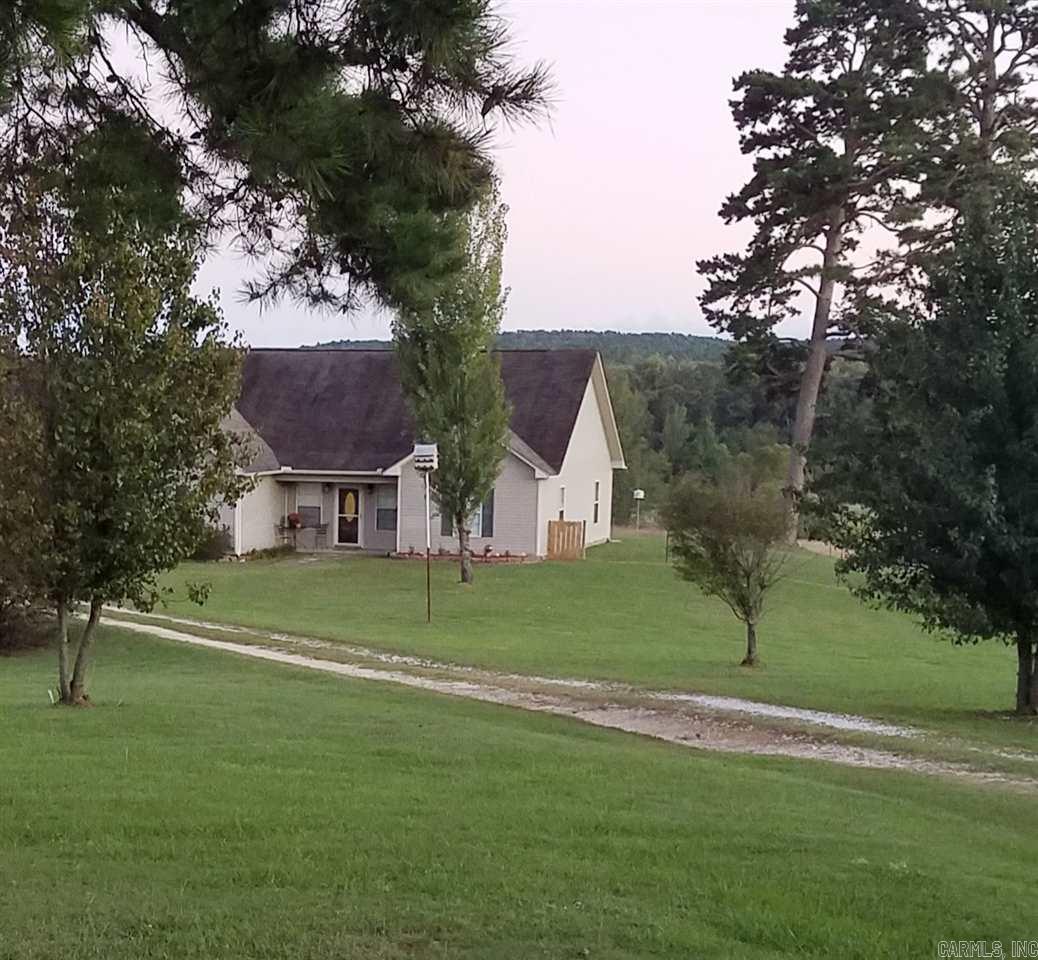 Beautiful Country Estate, 3.9 acres of awesome cleared land, rolling meadows, great view every direction, plenty of deer, other wildlife. Clean well groomed fishing pond. Home is well maintained, updated and clean, 1847 apprx sq feet, opens into great room with wood burning fireplace. beautiful floors throughout. Excellent kitchen, big laundry room, all electric, back door opens into a covered patio area. Yard is cross fenced, Red Metal Barn plenty big for play & storage. His/her walk-in closets in Master