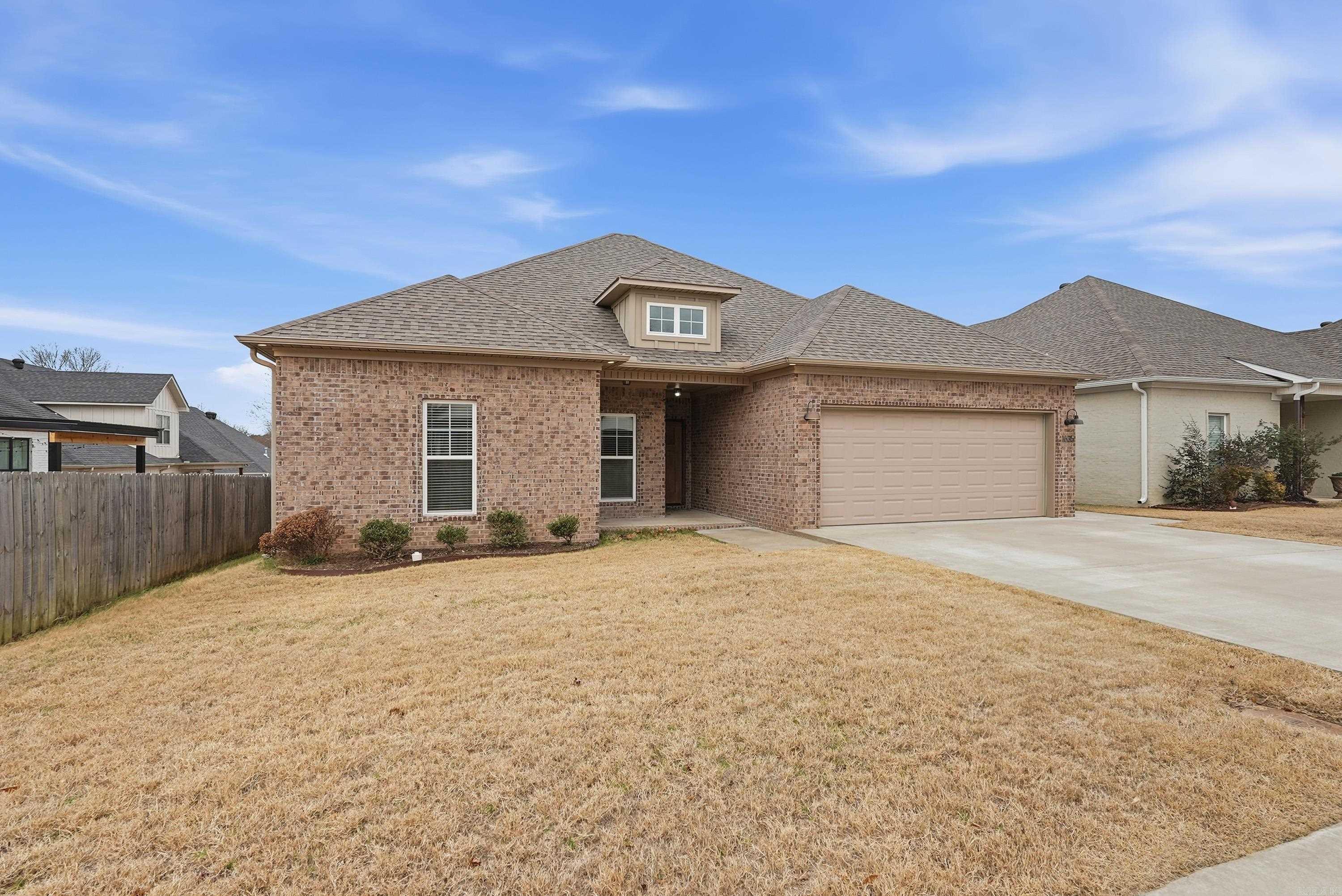 Step into this beautifully designed, move-in-ready home in West Conway where modern style meets everyday comfort. From the moment you enter, the open living space impresses with soaring 10-foot ceilings and oversized energy-efficient windows that fill the home with natural light. The kitchen is thoughtfully designed for both daily use and entertaining, showcasing quartz countertops, a generous island, and stainless-steel appliances—all within easy reach for practical, low-maintenance living. Clean lines, statement lighting, and striking built-in bookshelves in the hallway add character without excess.  The private primary suite serves as a relaxing retreat, complete with a soaking tub, walk-in shower, and a spacious walk-in closet. With a split floor plan, the primary suite remains peacefully separated from the rest of the home—perfect for quiet mornings and uninterrupted evenings.  Across the home, three additional bedrooms and a full bathroom provide flexible space for guests, hobbies, or a home office. Energy-efficient features such as a tankless water heater and spray foam insulation keep utility costs down. This turnkey home offers modern design with the setup ideal for you!